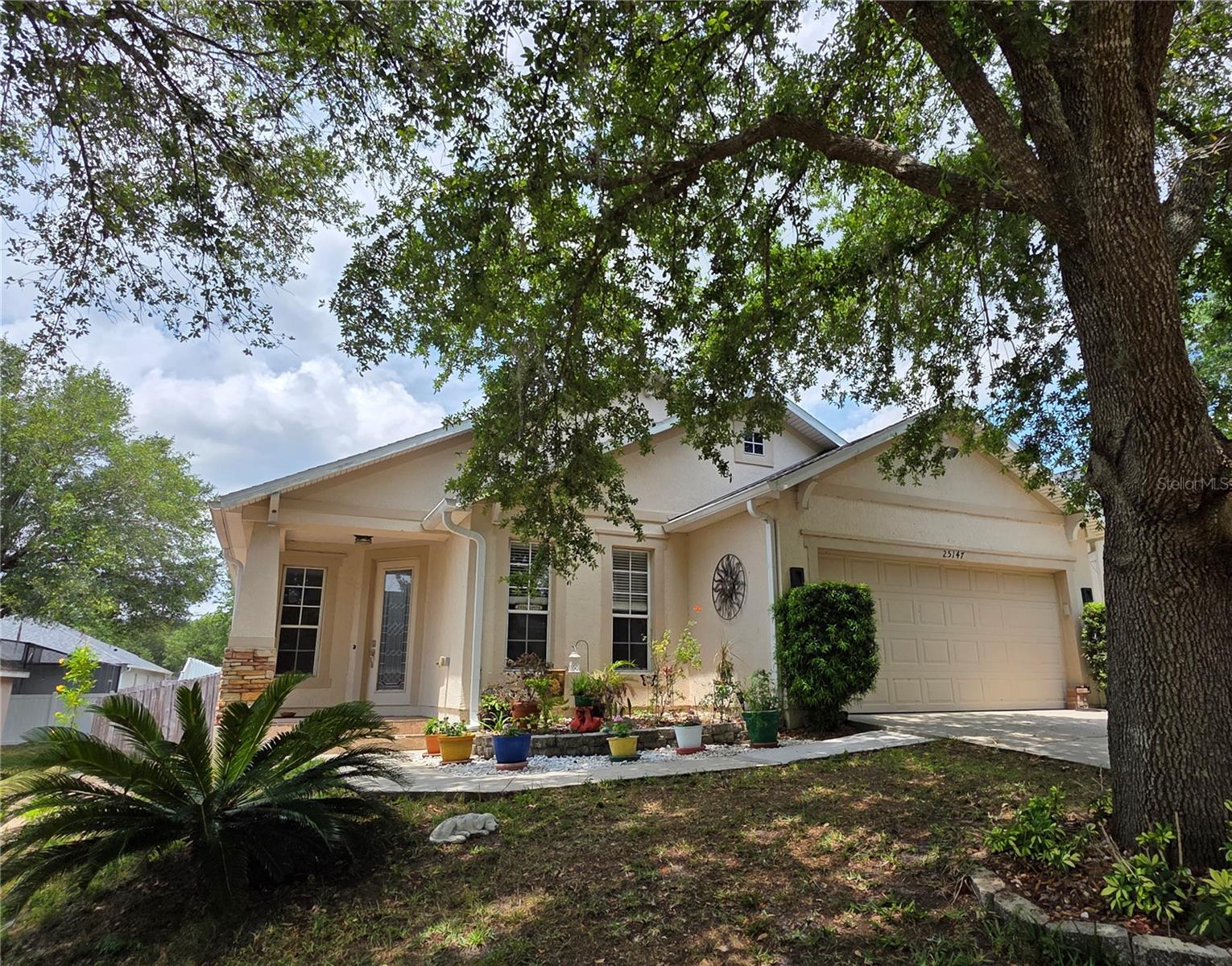 Welcome to this beautiful 3-bedroom, 2-bath home located in the desirable Fairways at Mount Plymouth community in Sorrento. This well-maintained home offers nearly 1,800 square feet of living space with a spacious open layout, granite countertops, and tile flooring throughout most of the home.

Two additional flex spaces provide incredible versatility. A front room can easily function as a guest room, home office, or additional sleeping space, while the main living area offers flexibility for a second lounge, media room, or work-from-home setup—perfect for today’s evolving lifestyle needs.

Step outside into your private backyard retreat, designed for both relaxation and entertaining. The custom pool features a natural stone finish, tranquil waterfall feature, and lush tropical landscaping, creating a true resort-style atmosphere at home. Enjoy evenings around the fire pit, host gatherings on the spacious patio, or unwind in your own secluded outdoor oasis. The large screened lanai provides additional covered space to relax year-round.

Major updates include a new roof (2021) and A/C system (2020). Built in 2006 using Mercedes Homes reinforced Solid Wall concrete construction, this home offers enhanced durability, storm resistance, and energy efficiency compared to traditional wood-frame homes.

Conveniently located near Mount Dora, the 429 expressway, area parks, and golf courses, this home offers both comfort and accessibility while still tucked within a peaceful community setting.

Move-in ready and designed for Florida living.