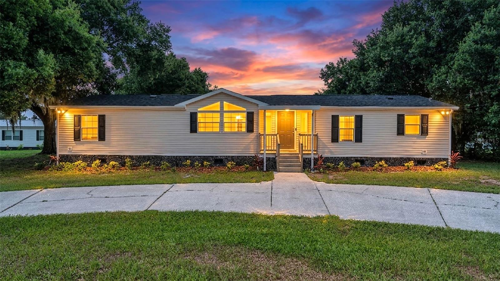 Welcome to your own private lakefront retreat. Completely renovated and move in ready. This beautiful updated 4 bedroom 2 bath home site on 3.25 acres of picturesque lakefront property and offer the peace, privacy, and freedom that are becoming increasingly hard to find. Newly renovated and truly turnkey, this rare lakefront property combines modern updates with the beauty and tranquility of country living. Inside, you'll find over 2,000 sq ft of thoughtfully updated living space featuring a split floor plan,generous living areas, new flooring, a fully remolded kitchen,fresh interior finishes, and countless improvements that make this home ready to enjoy from day one. Step outside and discover one of the properties most exceptional features-true frontage on the private 40 acre Lake Walker. With no public access, residents enjoy a peaceful setting ideal for fishing, kayaking, swimming, paddle boarding, and small boats. This is genuine lakefront living at its finest. The circle driveway and additional access points provide ample parking for guest, boats, RVs, and recreational vehicles, while the expansive property offers endless opportunities for outdoor recreation, gardening, hobbies, or simply enjoying the peaceful surroundings beneath mature oak trees. Three storage buildings provide exceptional flexibility and storage. Two lakeside buildings are equipped with electricity, including one outfitted with shelving and workbenches for workshop space and another ideal for storing lake toys, kayaks, and lawn equipment. A third storage building near the home offers convenient space for tools, bikes, and outdoor gear. With no HOA restrictions, room to roam, this property offers a rare opportunity to enjoy the best of Florida county living while remaining convenient to Lake Wales, Bartow, and surrounding Central Florida communities. If you've been dreaming of a move-in ready lakefront retreat with acreage, privacy, and modern updates already complete, this one is a must see.