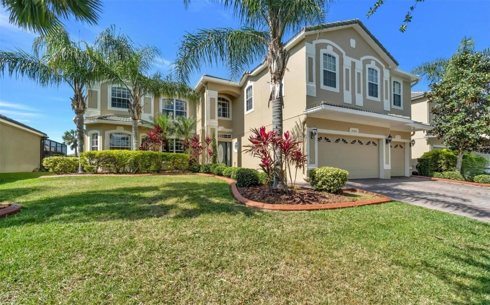 WELCOME TO PARADISE!! Golf-course living, lake access and resort-style amenities come together at 2106 Black Lake Boulevard in guard-gated Stoneybrook West Community. Set directly on the golf course, this impressive two-story residence offers more than 4,100 square feet of flexible living space with five bedrooms, four full bathrooms, an oversized bonus room and a three-car garage.

Designed for both everyday comfort and memorable entertaining, the main level features formal living and dining spaces, a spacious family room with a gas fireplace, an eat-in kitchen and a first-floor bedroom with access to a full bathroom—perfect for guests, a private office or multigenerational living. The kitchen offers granite countertops, 42-inch cabinetry, pull-out storage, a center island and generous workspace for cooking and gathering.

Upstairs, the expansive primary suite feels like a private retreat, complete with a sitting or study area and French doors opening to a full-length balcony overlooking the golf course. Three additional bedrooms and a massive bonus room provide endless possibilities for a media room, game room, fitness space, second living area or sixth bedroom. Wood-look tile and engineered wood flooring throughout mean there is no carpet in the home.

Step outside to the large screened lanai, where there is plenty of room to dine, entertain and enjoy the Florida lifestyle. The backyard also offers space to explore the addition of a future pool, subject to association and governmental approval.

Stoneybrook West offers an exceptional lifestyle with 24-hour manned security, golf, a clubhouse, fitness center, resort-style swimming, tennis, pickleball, basketball, playgrounds, sports fields, a fishing pier and access to skiable Black Lake with a community boat ramp. The neighborhood is conveniently located near Winter Garden Village, dining, medical facilities, major roadways, downtown Orlando, the airport and Central Florida attractions. 
Schedule you showing today and get ready to call this HOME YOURS!!