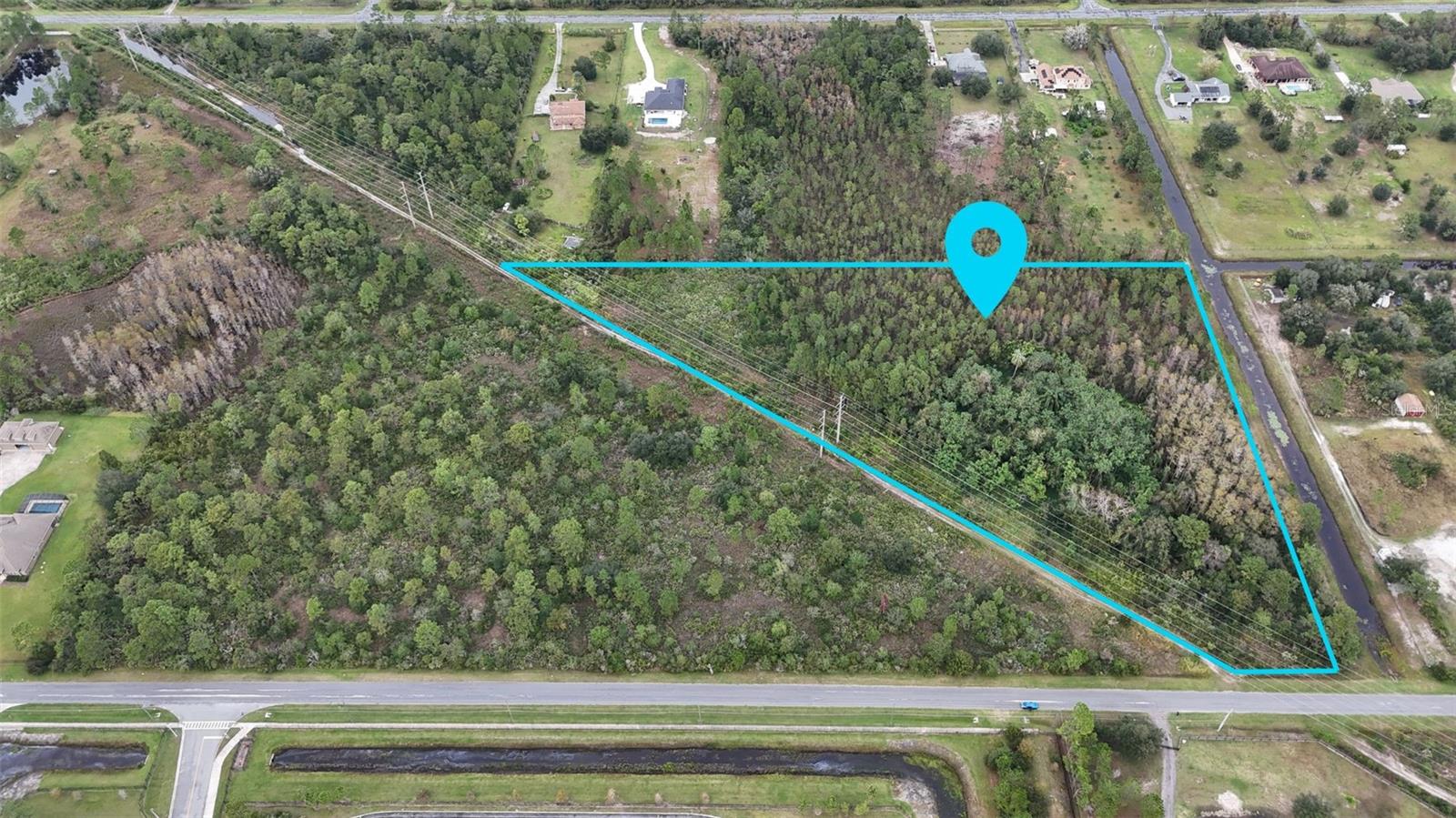 Prime Investment Opportunity! 8+ acres of land in Wedgefield, a top-tier community with 8500 acres of nature preserve, golf course, and skate park. Perfect for investors, builders, or developers. Close to major highways, Orlando Airport, and Lake Nona, not far from downtown Orlando. Go ahead and explore by yourself. Schedule a tour today! Buyer and buyer's agent to verify use and measurements.