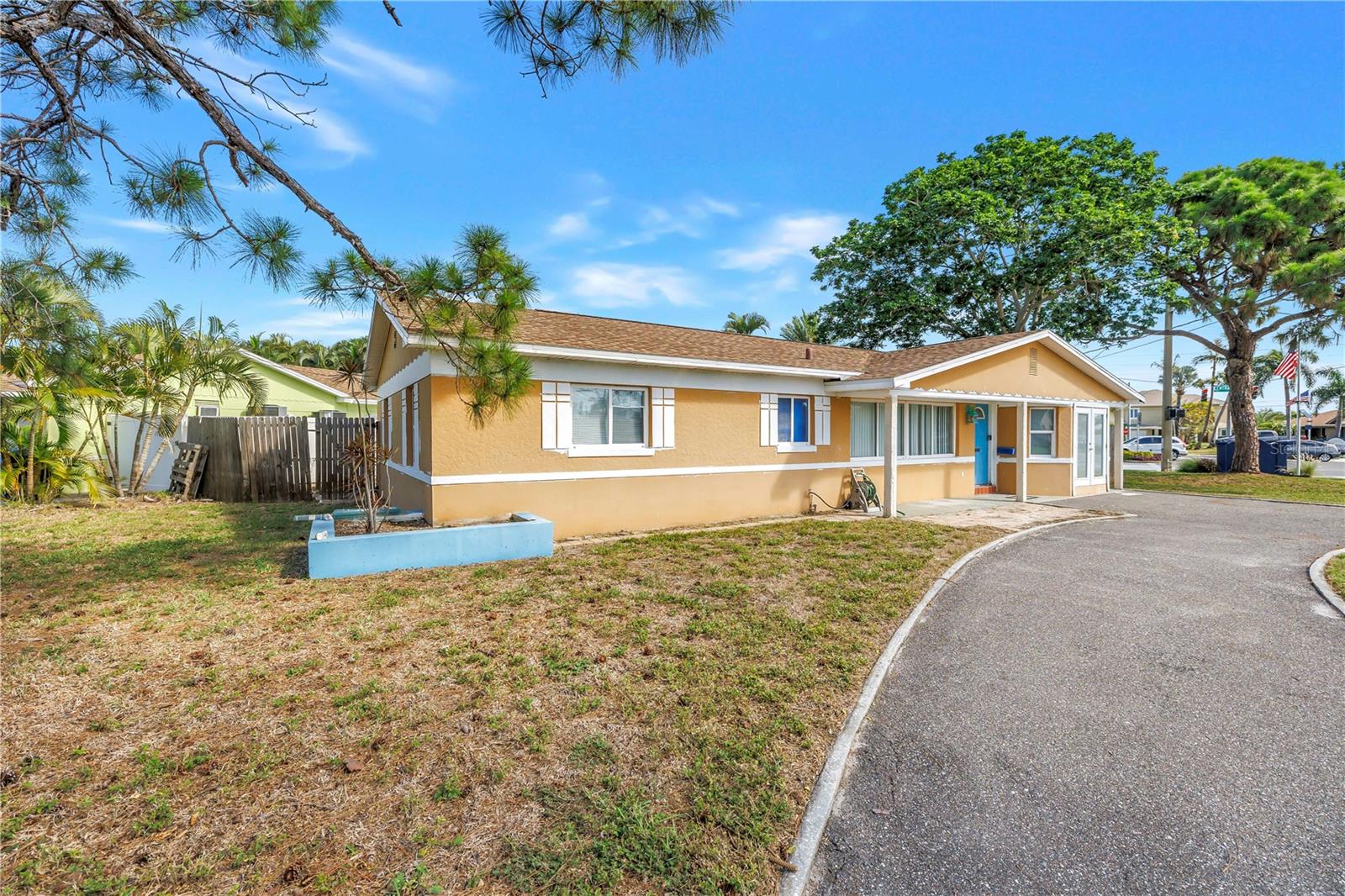 Incredible opportunity to renovate or rebuild your dream home just one mile from the sugar sands of Treasure Island Beach! Situated on a corner lot in the highly sought-after Causeway Isles neighborhood, this flood-damaged property offers incredible potential for investors, builders, or buyers looking to create their own coastal retreat.

The home was remediated immediately following the 2024 storms and features a 2022 roof, new 200 amp electric panel, along with hard-wired electrical, and building permits already in place. Whether you're planning a renovation or envisioning a custom rebuild, these improvements provide a strong head start on bringing your vision to life.

Enjoy the best of Florida living with a short bike ride or walk to the beach, a quick drive to vibrant downtown St. Petersburg, and convenient access to countless restaurants, shopping destinations, and beach favorites, including Sloppy Joe's, Middle Grounds Grill, and Ricky T's. The nearby beachfront path hosts beloved local events throughout the year, such as the Sanding Ovations sand sculpture festival, kite festivals, and the weekly Sunday Sunset Drum Circle.

Whether you choose to renovate the existing home or start fresh, this is a rare chance to secure a property in one of the area's most desirable waterfront communities and make it your own piece of paradise at an exceptional value.