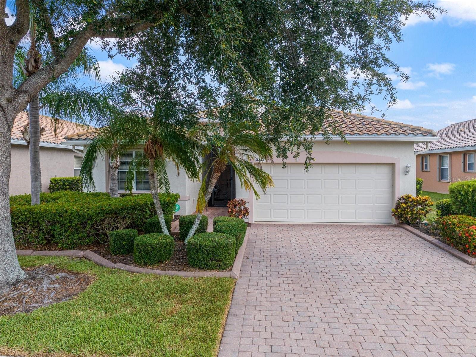Two bedrooms, a den, and water views in one of Sarasota's most active 55+ communities — and no CDD fees.
This home in Cascades at Sarasota has been well cared for and is completely carpet-free, with tile and luxury vinyl plank throughout. The layout works: an eat-in kitchen with updated finishes, a separate dining area, two comfortable bedrooms, and a den that works well as a home office or hobby room. The extended screened lanai has water views, sunsets, and enough room to actually entertain — not just two chairs and a side table.
Cascades is a gated, maintenance-free community with lawn care included and no CDD fees. The 25,000-square-foot clubhouse was recently renovated and includes a heated indoor-outdoor pool, fitness center, banquet hall, six Har-Tru tennis courts with a full-time pro, pickleball, bocce, and an arts and crafts room with two pottery kilns. There's a full activity calendar if you want it, or you can keep to yourself — the community supports both.
Location-wise, you're about 15 minutes from downtown Sarasota, the Ringling Museum, and Selby Gardens. Siesta Key, Lido Key, and Longboat Key are all within easy reach. UTC Mall and St. Armands Circle are close for shopping and dining, and Sarasota International Airport is convenient for traveling.