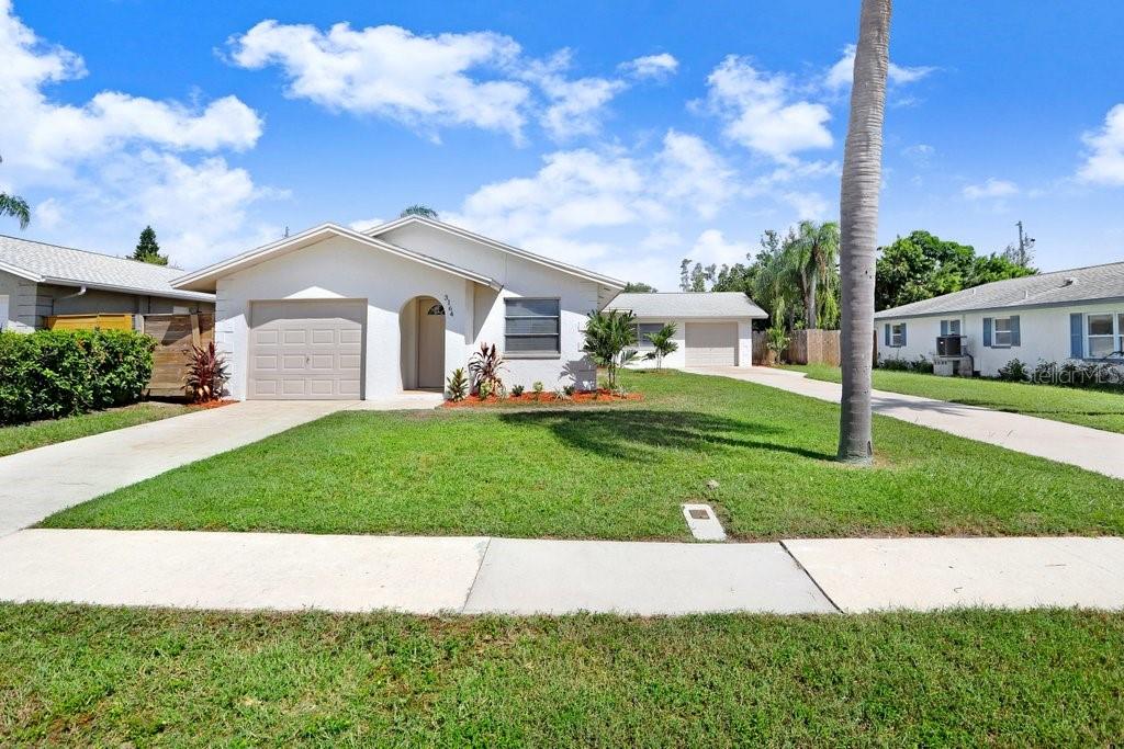 Beautifully updated duplex in Clearwater, this property offers two well-appointed 2-bedroom, 1-bathroom units that combine modern updates with practical living spaces. Each unit features a gourmet kitchen with stainless steel appliances, quartz countertops, and white shaker cabinets with ample storage. Bathroom layouts vary by unit: Unit A showcases quartz countertops with a standalone shower, while Unit B offers quartz countertops with a shower/tub combo. Both units boast laminate flooring throughout the living areas and fresh paint, creating a bright, move-in ready feel. Sliding doors open to the backyard, enhancing indoor-outdoor living, and each unit includes a 1-car garage with laundry hookups inside. The shared fenced backyard provides privacy and space for outdoor activities. Located near St Rd 60, the property offers convenient access to downtown, beaches, shopping, and dining, making it an ideal setting for both owner-occupants and investors. This turnkey duplex combines solid updates, strong rental appeal, and a coveted Clearwater location—contact us today to schedule a private tour.