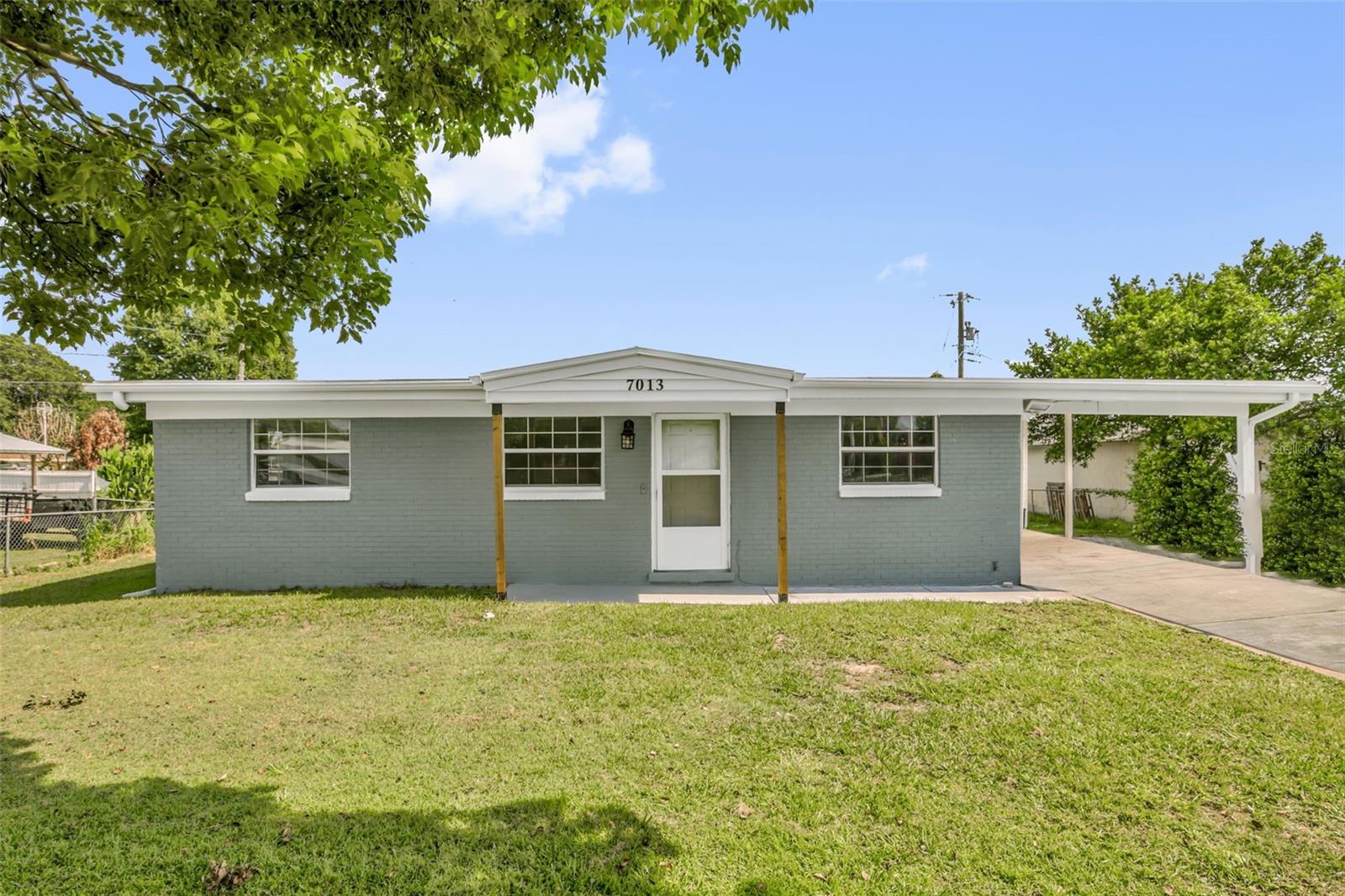 Updated and move-in ready, this 3-bedroom, 2-bathroom home has NO HOA and is located in the Azalea Park community. The remodeled kitchen features modern finishes and opens to a cozy dinette area overlooking the living room. Beautiful porcelain tile flooring extends throughout the main living areas, offering both style and durability. The split-bedroom floor plan provides added privacy by separating the primary bedroom from the secondary bedrooms. A spacious utility and laundry room located just off the kitchen offers additional storage and convenience. Enjoy a large backyard with plenty of room for outdoor entertaining, pets, gardening, or future improvements. Conveniently located near Orlando International Airport, Downtown Orlando, SR-408, SR-417,  medical facilities and more. Whether you're a first-time homebuyer, looking to downsize, or searching for a great investment property, this home offers endless possibilities.