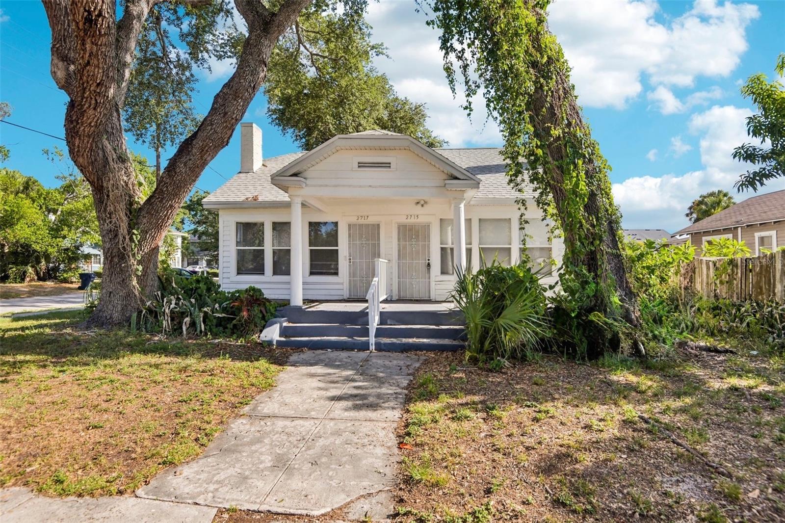 **Investment Opportunity in the Heart of Tampa!** This charming 1924 bungalow offers exceptional flexibility and income potential, currently configured as two separate 1-bedroom, 1-bathroom living units measuring approximately 760 and 744 square feet. With a proven rental history generating nearly $3,000 per month, this property is ideal for investors seeking immediate cash flow or buyers looking to explore future possibilities. Each unit features its own private entrance from the classic Florida front porch and includes a spacious living room, full kitchen, bathroom, and comfortable bedroom. A brand-new roof installed in 2025 provides added peace of mind, while the property's timeless character creates an inviting foundation for future enhancements. Ideally situated just north of Kennedy Boulevard, you'll enjoy quick access to South Tampa, West Tampa, Downtown Tampa, the Westshore Business District, Midtown Tampa, Tampa International Airport, and an outstanding selection of local restaurants, shopping, and entertainment. Whether you're looking to expand your investment portfolio or unlock the full potential of this historic property, this is an opportunity you won't want to miss.
