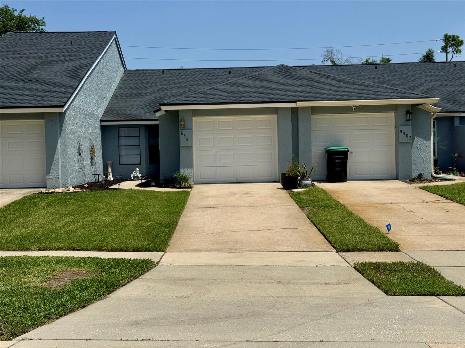 MOVE IN READY!! Welcome to Citrus Chase in Dr Phillips. This home features 2 bedrooms, 2 bathrooms, with a one car garage and approximately 1,050 heated sqft. Extensive recent updates, including fresh paint throughout, a new AC unit, and upgraded electrical fixtures. The interior boasts a kitchen with stone countertops and oak cabinets, a great room with a marble topped fireplace, and updated bathrooms. Outside, the property offers a large, fenced paved backyard with a fire pit, as well as a furnished, screened in patio and a landscaped front courtyard. Located in a quiet community with access to a pool, tennis courts, and a clubhouse This desirable area is centrally located near shopping centers, top restaurants, grocery stores, international drive, Disney, MCO, and A-rated schools. Schedule your private showing today!