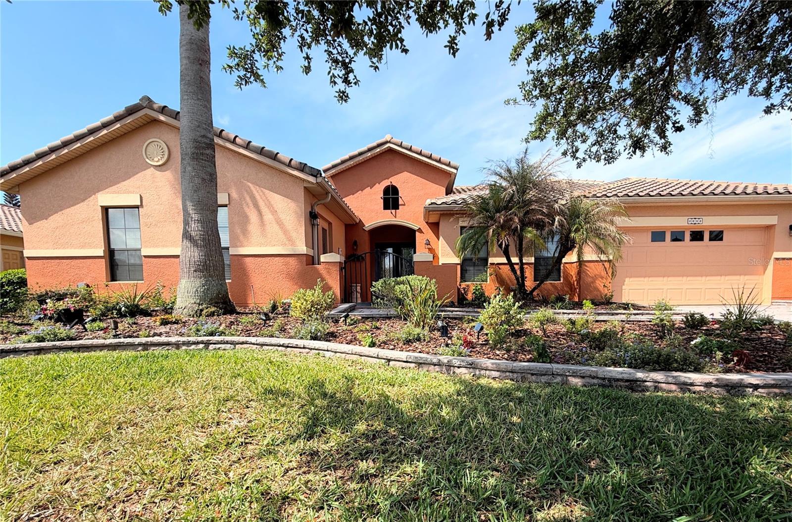 TURNKEY home, with furnishings, accessories and decorator art included, this beautifully appointed BILTMORE model offers 3,110 square feet on a .25 acre CONSERVATION lot, situated on a low-traffic street in the desirable Portofino Estates subdivision. Enter through the courtyard and French doors to experience this impressive home, thoughtfully designed for both everyday living and entertaining.


Enjoy beautiful conservation views from the oversized, TILED LANAI, which is screened, partially covered and accessible from the living room, Florida room, primary suite, and main guest bathroom. This home is ideal for hosting large gatherings both indoors and out.


The kitchen is well-appointed with STAINLESS STEEL APPLIANCES, BUILT IN DOUBLE OVENS, a cooktop with a vent hood, GRANITE countertops, 42" soft-close upper cabinets, pull-outs in the lower cabinets, recessed lighting, and a WALK-IN pantry. Kitchen cabinets have been recently refinished. The dining room features a double tray ceiling and a large chandelier.


Features include 8' doors and 5.5" baseboards throughout, 12' VOLUME CEILINGS in the main living area, ceramic TILE in the main living areas, bathrooms, laundry room, flex/bonus room and lanai, with carpet in the bedrooms. 

The OVERSIZED primary bedroom offers a TRAY ceiling, CROWN MOLDING, a sitting area, 2 WALK-IN CLOSETS, and access to the lanai. The primary bathroom includes two raised vanities with granite countertops, a soaking tub, and a separate shower.  In 2026 the shower was upgraded with a new frameless glass enclosure.                                                                                                                                             A spacious BONUS/FLEX room measuring 21'4" by 11'8" features French doors leading to the courtyard and can easily serve as a private office or guest space with its own entry.

Bedrooms three & four share a Jack & Jill bathroom with a raised vanity (two sinks), GRANITE countertop, tub/shower combination, and comfort height commode. The third full bathroom features a raised vanity with a granite top, a HYDROTHERAPY JETTED TUB and shower, with direct access to the lanai. Bedroom two offers conservation views. 

Additional features include ceiling fans in major rooms, DUAL PANE windows, and 2" faux blinds throughout. The laundry room is equipped with a GE washer and dryer, sink with cabinet, overhead cabinets, and a closet, along with a nearby hallway linen closet.

Major updates and extras include two HVAC systems replaced in 2021 and 2022, a whole-house water softener, a water main to the home with a brass shut-off valve, a garage with epoxy flooring and large built-in cabinets, landscape lighting on timers, a barrel tile roof, and a Ring doorbell with real-time video monitoring.  MAKE THIS YOUR HOME TODAY!