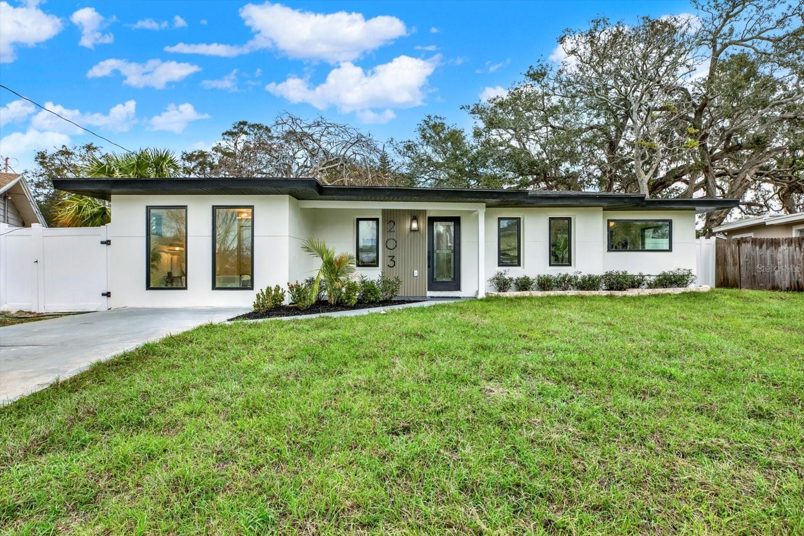 This thoughtfully designed masterpiece offers the ultimate blend of luxury lifestyle, location, and income potential. Rare, FULLY RENOVATED in 2025 showstopper in Baywood Village — an exceptional opportunity in one of Palm Harbor’s most sought-after communities. Modern upgrades, PRIME location, and short-term rental potential all come together in this move-in-ready 3-bedroom, 2-bath home. FULLY PERMITTED improvements completed in 2025 include: New Roof, NEW HVAC system, Hurricane-Impact Windows and Doors, New Stucco Exterior, Tankless Water Heater, and updated electrical and plumbing systems. Inside, enjoy a bright open-concept layout with luxury vinyl plank flooring throughout. The designer kitchen features quartz countertops, a brand-new stainless steel appliance package, sleek cabinetry, and a contemporary backsplash. Both bathrooms are fully remodeled, including one with a smart toilet for added convenience. Zoned for short-term rentals with projected income up to $60,000 annually, this property is ideal for investors, seasonal residents, or full-time homeowners seeking flexibility and strong returns. Just moments from Sunset Beach, championship golf at Innisbrook Resort, the natural beauty of Fred Howard Park, and the iconic Tarpon Springs Sponge Docks, you’re surrounded by some of the best coastal attractions Tampa Bay has to offer. Coastal living, championship golf, world-class parks, and vibrant waterfront dining — all just minutes from your front door. Schedule your private showing today.