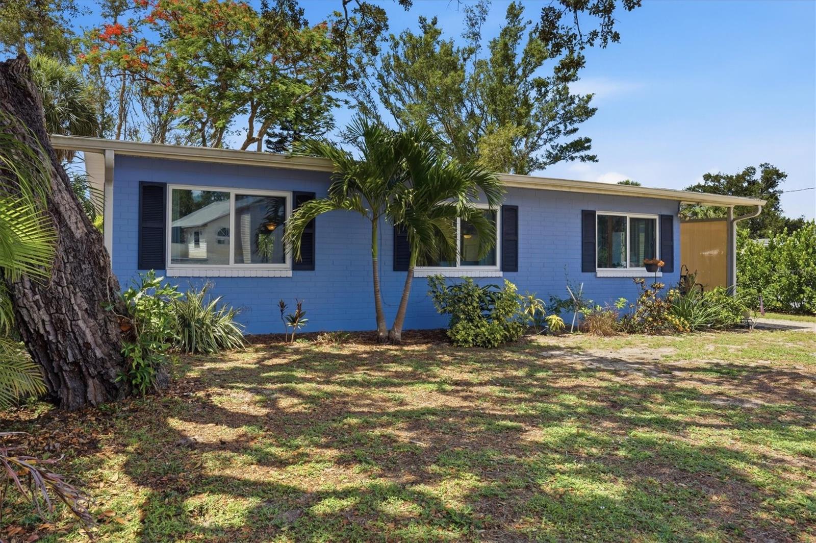 Charming 3BR/2BA Block and Brick Cottage Style home in Non-Deed Restricted area of Nokomis. Comes with Deeded access to Shakett Creek/Dona Bay diagonally across from the home. Legacy Trail access and county boat launch are very close by, and the property has room to park your boat or RV. This is the old Florida feel and location that you have been looking for with bay breezes and mature trees to keep you cool. The home has been updated with Hurricane Impact windows in 2020 and a New Roof in 2017, and has never flooded for great peace of mind. The kitchen has Stainless Steel appliances, solid wood cabinets, and tons of counter space for cooking or baking. The flowing floor plan with 1720 Total Sq footage provides plenty of storage and usability from the wood ceiling and floored Living Room open to the Dining Room, Kitchen, and oversized screened Lanai, leading out to the lush and lovely backyard where gardens, mature trees, deck, hot tub, and outdoor shower complete the Florida lifestyle for your thorough enjoyment. This warm and inviting yet light and bright home is calling your name, call your agent to set up your private viewing today!