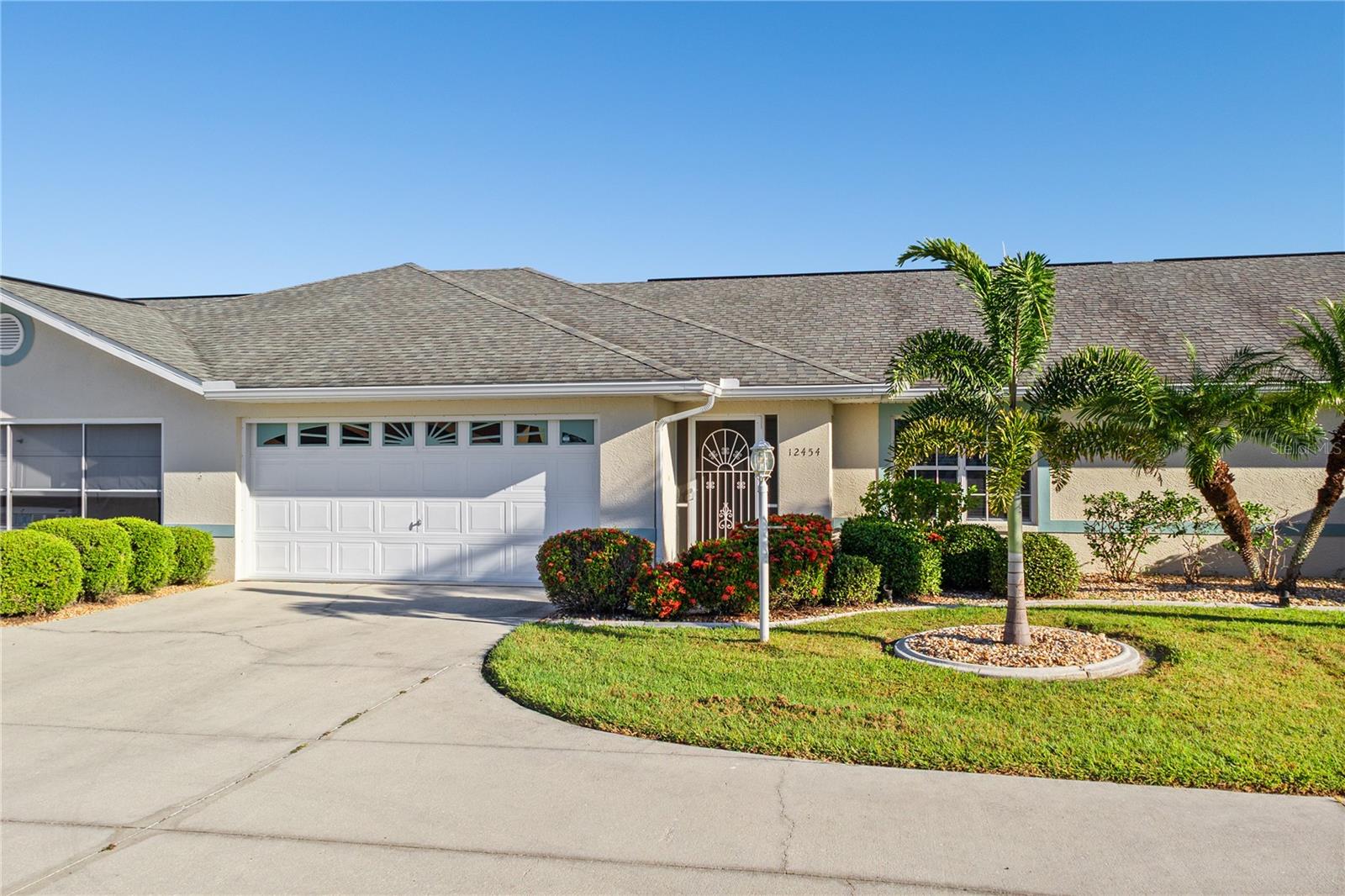 Welcome to South Shore in beautiful Lake Suzy! This stunning move-in ready, fully furnished 2-bedroom, 2-bath lakefront villa combines comfort, style, and easy living — all with incredible views of the water.

Step inside to an open, light-filled floor plan with vaulted ceilings and luxury vinyl plank flooring throughout. The kitchen features recently updated stainless steel appliances and flows effortlessly into the dining and living areas, creating the perfect space for relaxing or entertaining.

You’ll enjoy peaceful lake views from almost every room — including the dining room, Florida room, and primary suite. The Florida room, complete with windows and screens, offers the ideal spot to start your morning coffee or unwind in the evening breeze.

The thoughtful split floor plan provides privacy for both bedrooms, each featuring a walk-in closet, and the primary suite includes its own private bath.

Additional highlights include a newer roof, A/C, and water heater, fresh interior paint, and a two-car attached garage.

South Shore is a quiet, pet-friendly, maintenance-free community. All exterior maintenance is included — lawn care, pest control, and even driveway pressure washing — plus residents enjoy access to a community pool.

Best of all, this waterfront villa is located in Flood Zone X — no flood insurance required!

Homes in South Shore rarely become available — don’t miss your opportunity to experience turnkey, lakefront living in Lake Suzy!