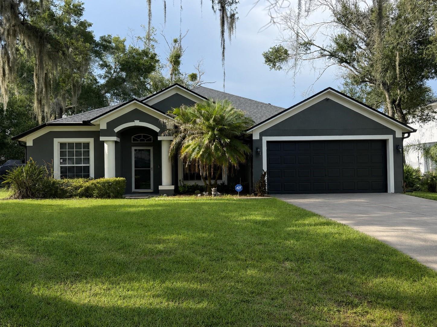 Welcome Home to 3010 Norvell Court – Deltona, FL
Space, comfort, and versatility come together in this beautifully designed home, perfect for families who love room to grow and gather. Step inside to find large, light-filled living spaces anchored by a formal living room and separate formal dining room — ideal for entertaining or holiday gatherings. The spacious family room offers a relaxed setting for everyday living, while the open kitchen keeps you connected to the action, whether you're prepping dinner or catching up with guests.
Oversized bedrooms and soaring high ceilings add to the sense of openness throughout, giving every room a bright, airy feel. Step outside to your covered patio, the perfect spot for morning coffee or evening unwinding, overlooking an oversized lot with plenty of room to garden, play, or simply enjoy the extra space. (Note: neighboring property is currently adding a fence, which will offer additional privacy soon.)
Updated electrical gives you added peace of mind, and car enthusiasts, boat owners, or anyone needing extra parking will love the extra-long driveway, offering plenty of room for multiple vehicles, an RV, or a boat.
This is a home built for comfortable living and effortless entertaining. Schedule your private showing today!