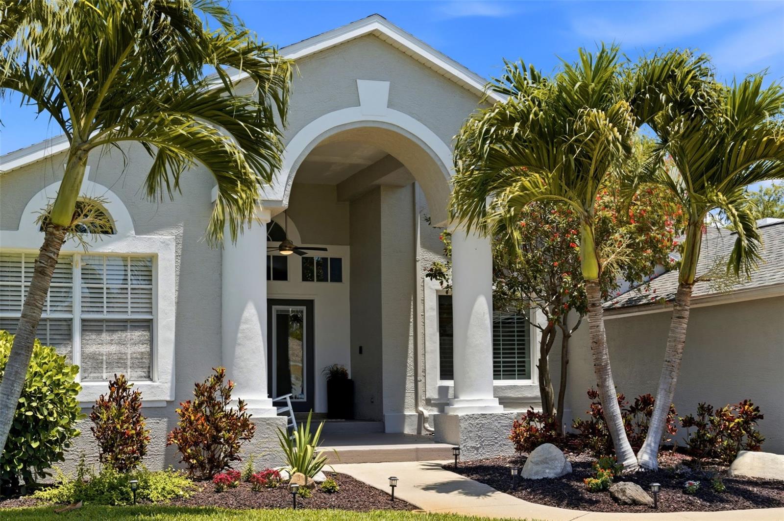 Welcome to 631 DeSoto Drive in beautiful Tierra Verde, Florida — a completely updated, move-in ready home offering the perfect blend of luxury, comfort, and Florida lifestyle living. Ideally located just minutes from St. Pete’s award-winning white sand beaches, downtown St. Petersburg, Fort De Soto Park, and only 35 minutes to Tampa International Airport, this exceptional residence places you in the heart of one of Tampa Bay’s most desirable waterfront communities. This spacious single-story home lives much larger than its square footage and features a flexible open floor plan designed for both everyday living and effortless entertaining. High ceilings and abundant natural light create an airy, welcoming atmosphere throughout the home. The thoughtfully designed split-bedroom layout includes 3 bedrooms, 2 full baths, a convenient pool bath, and a versatile office/den that can easily function as a 4th bedroom, guest space, or work-from-home retreat. The generous primary suite offers privacy and comfort, creating the perfect place to unwind. At the center of the home is a beautifully updated kitchen featuring a large island, stylish finishes, and seamless flow into the living and dining spaces. Additional interior highlights include wide plank bamboo flooring, plantation shutters, and a cozy wood-burning fireplace that adds warmth and character. Step outside to your private backyard oasis complete with mature tropical landscaping, a screened pool enclosure, and expansive outdoor living space designed for year-round enjoyment. Whether hosting gatherings or enjoying peaceful evenings at home, this property truly captures the essence of resort-style living. Located in the highly sought-after community of Tierra Verde, residents enjoy close proximity to boating, marinas, waterfront dining, biking trails, nature preserves, and some of Florida’s most beautiful Gulf beaches — all while being just 10 minutes from vibrant downtown St. Petersburg. If you’ve been searching for a move-in ready Tierra Verde home with a pool, flexible floor plan, updated finishes, and an unbeatable location, 631 DeSoto Drive is a must-see. Experience the feeling of living on vacation year-round.