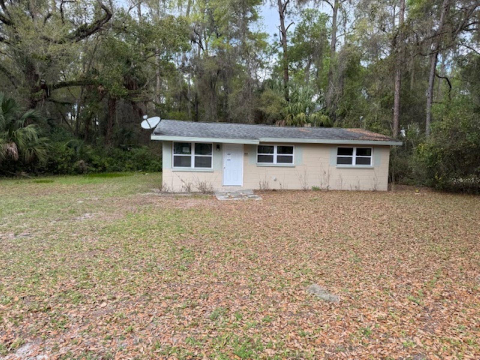 If you are a nature enthusiast and enjoy boating, hiking and outdoor activities, look no further!  This charming  2 Bd/ 1 Ba home with an abundance of light is your perfect retreat.  After spending the day at Rainbow Sprngs State park or on the Withlacoochee River, you can return to your cozy home to relax and continue to enjoy nature in your own yard surrounded by beauitul trees.  You can't beat Dunnellon for endless opportunities to enjoy nature.  Never fear if Golf is your passion, it has premier golf courses as well.  The home needs some TLC, but you won't believe the price!  Hurry, this one will go fast.  REPORTED: "..an unsolved murder that occurred in this home in 2000..". Seller has not independently verified this information. Buyer to conduct due diligence.