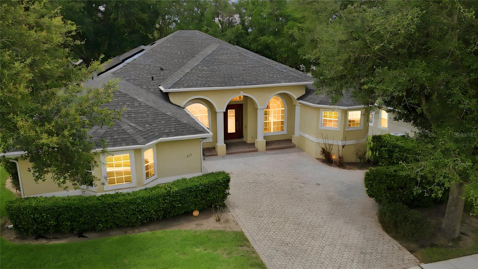 Virtually Staged. Beautifully situated in the desirable Errol Estates community, this spacious single-story home offers an exceptional blend of comfort, functionality, and privacy. Featuring 4 bedrooms, 3 full bathrooms, a dedicated flex room/office, and a highly sought-after split-bedroom floor plan, the layout is designed to accommodate both everyday living and entertaining.

The private owner's suite is tucked away on one side of the home and serves as a true retreat, complete with sliding glass doors showcasing peaceful trees views. The en-suite bathroom features dual sinks, an oversized shower, a soaking tub, and two spacious closets. Three additional bedrooms are located on the opposite side of the home, providing privacy and flexibility for family and guests. 

At the center of the home, the kitchen seamlessly connects to the family room, creating the perfect gathering space. Separate formal living and dining rooms add versatility for entertaining and special occasions, while the flex room offers endless possibilities as a home office, study, fitness room, or playroom.

Enjoy the beauty of the natural surroundings with serene tree views and a peaceful atmosphere. Located in the established Errol Estates community, residents appreciate the quiet, tree-lined streets and convenient access to shopping, dining, parks, major highways, and everything Central Florida brings to you.

An amazing floor plan, generous living spaces, and a prime location make this home a standout opportunity in one of Apopka's most sought-after communities.