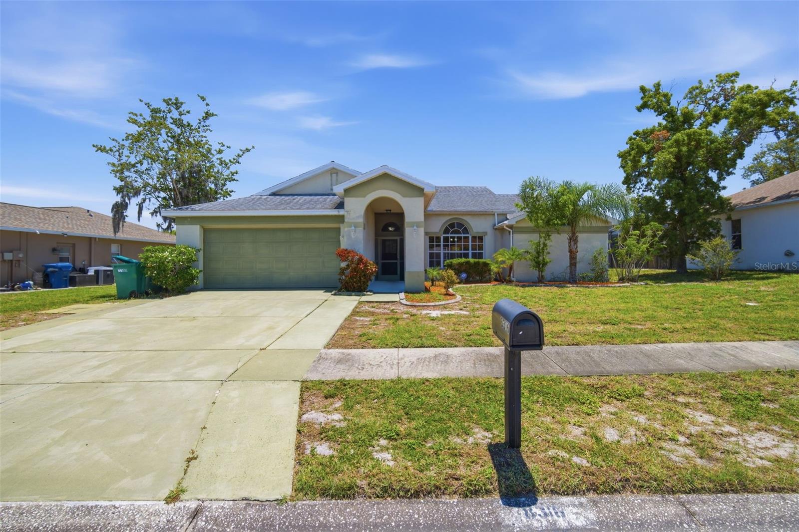 Virtually Staged. Welcome to Orchid Lake Village, where comfort, convenience, and the Florida lifestyle come together. Ideally located just minutes from everyday shopping, dining, highly rated schools, Gulf beaches, and nearby state parks, this beautiful three-bedroom residence offers the perfect blend of indoor comfort and outdoor living. Step inside to discover an inviting, open floor plan highlighted by soaring vaulted ceilings and an abundance of natural light. The spacious living room flows effortlessly into the family room, creating an ideal layout for both everyday living and entertaining. Thoughtfully selected flooring adds warmth and character throughout the home. The kitchen is designed with functionality in mind, featuring generous cabinet and countertop space, matching appliances, and a convenient breakfast bar that serves as the heart of the home for casual meals and conversation. Privately situated, the primary suite offers vaulted ceilings, direct access to the outdoor living space, and a spacious en-suite bathroom complete with dual vanities and a walk-in corner shower. Two additional bedrooms provide flexibility for family, guests, or a dedicated home office. Step outside to your own private backyard retreat where a covered lanai overlooks a sparkling screened-in swimming pool, perfect for enjoying morning coffee, hosting weekend gatherings, or relaxing after a day at the beach. Offering an exceptional combination of location, thoughtful design, and outdoor living, this is Florida living at its best. Call today to schedule your private showing!