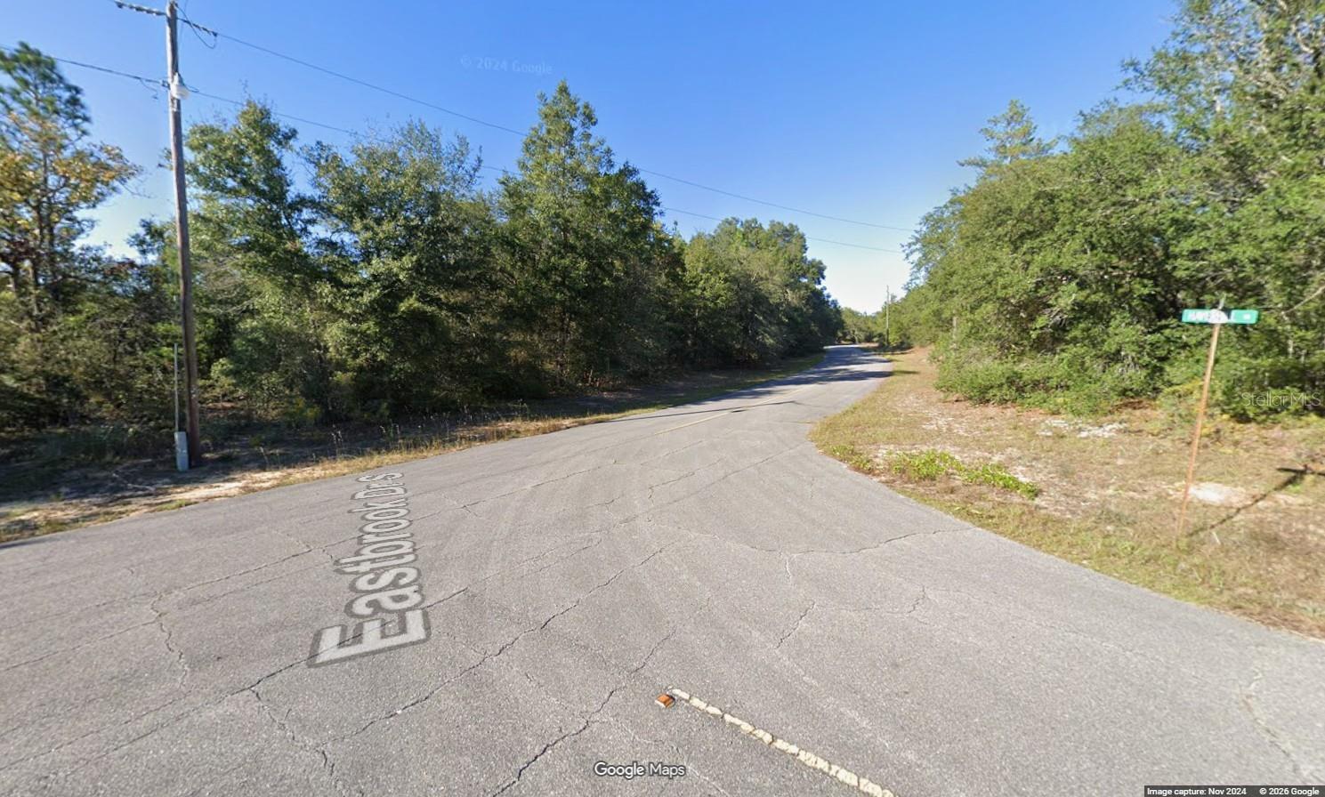 Wooded building lot in Sunny Hills!! On a paved road!! Nice, new homes nearby!! Just a Short distance off Sunny Hills Blvd. Water lines and power lines already on the street!!  100% free and clear title with warranty deed!! No HOA!! No time limit to build on the lot!! No mobile homes are allowed in Sunny Hills!! Lots of things to do in the area! The nearby Sunny Hills Golf and Country Club includes a restaurant, putting greens, and a driving range for hours of relaxing fun. Multiple lakes are in the subdivision, including Boat Lake (less than 2 miles away) with the Swim Park for picnics and sunbathing!!  Just a short drive to Panama City, with loads of shopping and the new airport!! Call today, don't miss out!!