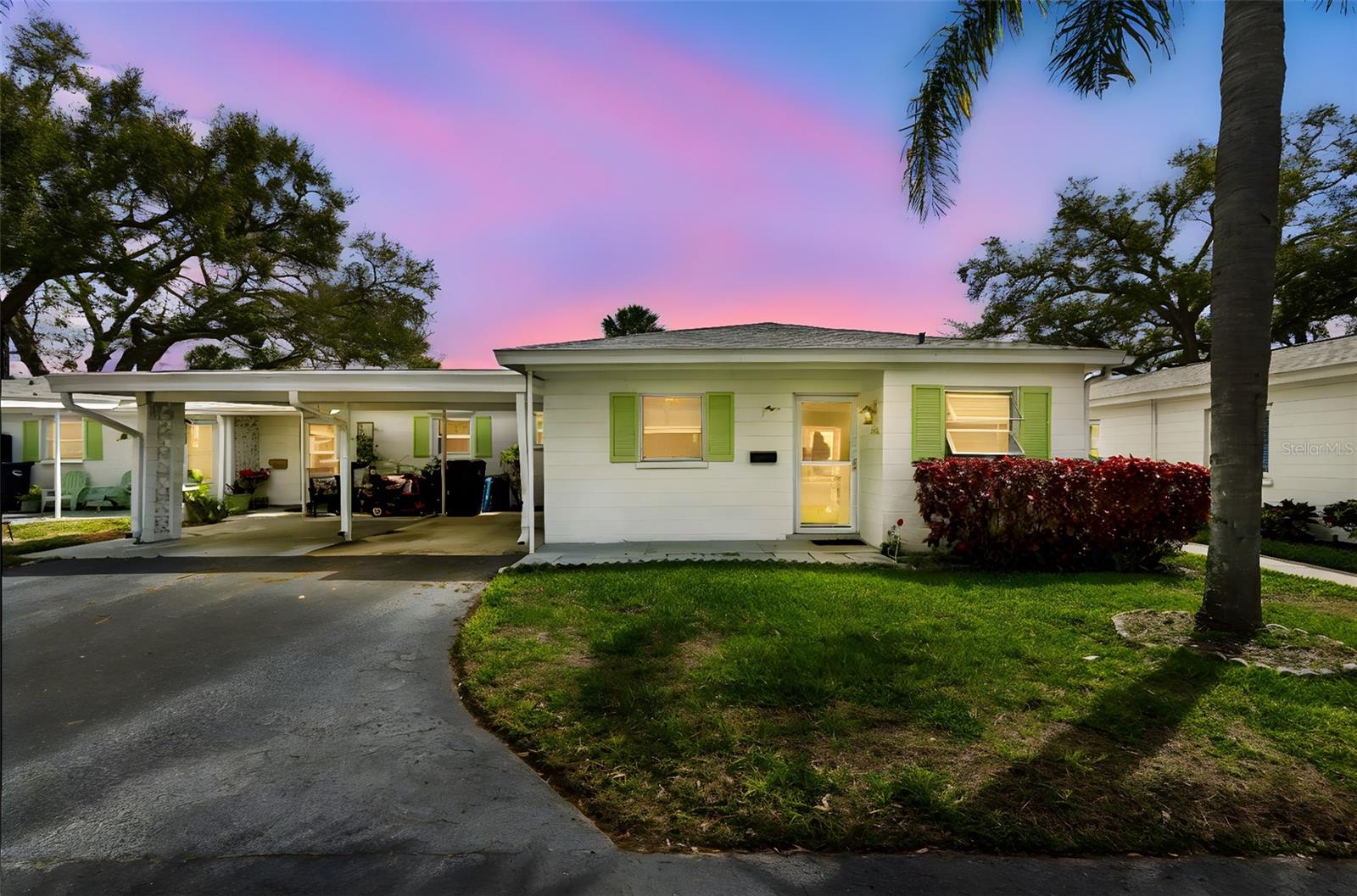 One or more photo(s) has been virtually staged. PRICE IMPROVEMENT!! Looking for the perfect 55+ community home that checks every single box? This villa-style end unit condo is your ultimate lifestyle upgrade! HUGE BONUS- Community pool is outside your back door! Nice fenced in back porch and also an attached carport make this a great choice!
This spacious 2-bedroom, 2-bathroom split plan even has an attached carport, great storage inside and enclosed bonus room. Newer HVAC system as well. Full size washer and dryer. The huge great room is perfect for hosting dinners, gatherings or creating your dream living area. Luxury vinyl plank floors throughout mean easy cleaning and a modern look with low maintenance. This community is pet-friendly, welcoming one small furry friend to call this home.This community is so convenient- Close to shopping, restaurants, medical facilities, beaches, and the airport – with a bus line nearby. The community pool and updated clubhouse with a kitchen and library are just waiting for you to make new friends and create memories. This isn't just a condo – it's your ticket to a lifestyle of comfort, convenience, and community. HOA fees include Spectrum cable and internet! Also exterior (including roofs), grounds, pool maintenance are included. Don't miss your chance to make this your new Florida home sweet home!