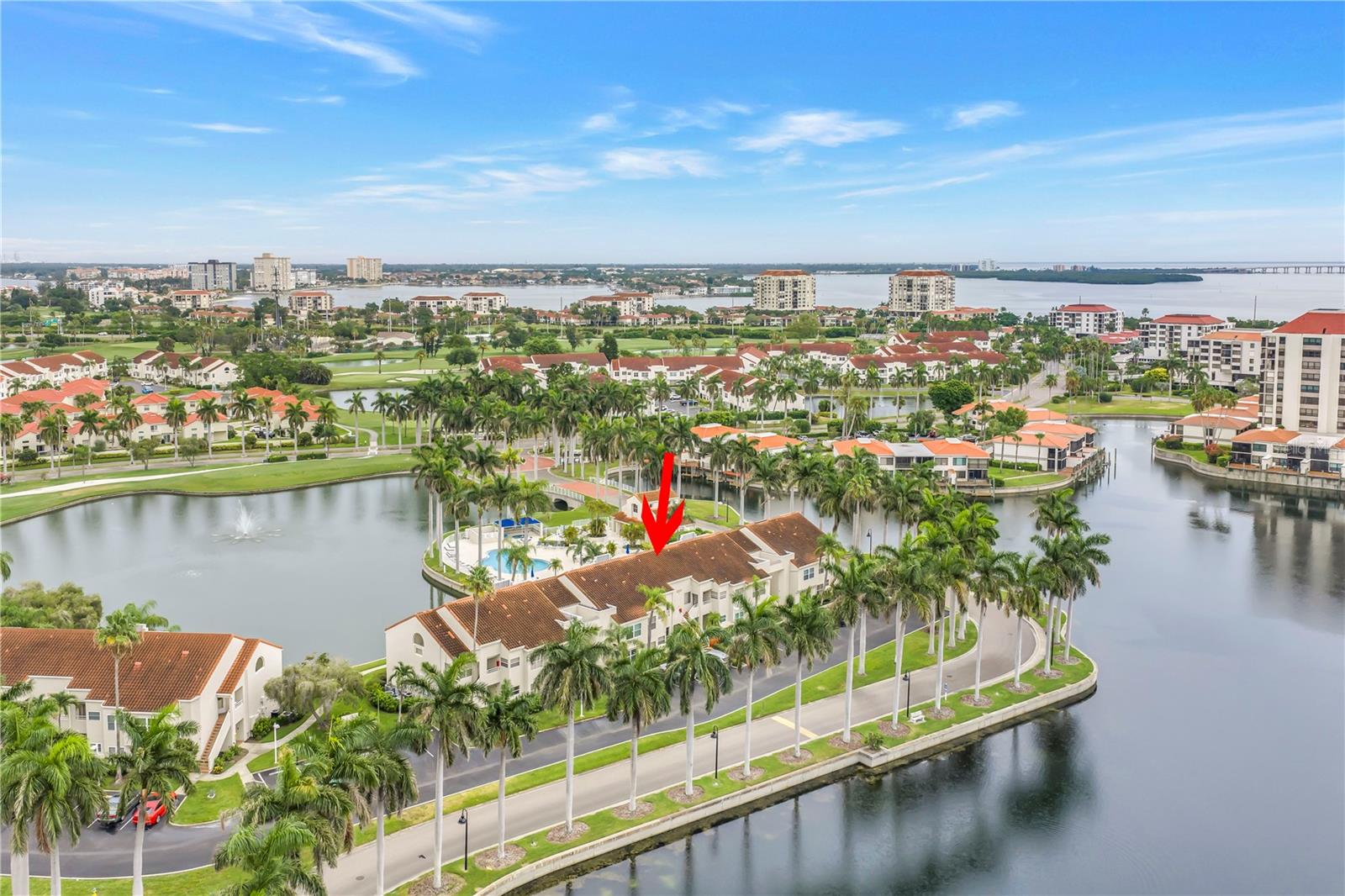 WOW!  Welcome to paradise!  This updated furnished condo is immaculate and move in ready!  Large custom kitchen with quartz counters, stainless steel appliances, and a breakfast nook.  Open living/dining area with luxury vinyl floors throughout the entire unit. High ceilings with popcorn removed! Updated bathrooms. Primary suite offers a large walk in closet and private ensuite with a double vanity.  Isla Del Sol offers tropical outdoor Florida living at its finest! Enjoy relaxing lake views from all windows in the unit and balcony. Steps to the sparkling community pool. Residents have the option to join the Isla Del Sol Yacht and Country Club, offering golf, tennis, marina, and social memberships (fees apply).  Great for full-time residents but also an awesome opportunity for seasonal enjoyment... short term (1week) rentals are allowed offering flexible options to owners.  Minutes to Fort Desoto Beach/ County Park, boat ramp, pavilions, bike paths, playgrounds, fishing pier ...  plenty of locations to launch your kayak or rent one!  Head a few minutes in the other direction to St. Pete Beach with tons of white sands, restaurants, shops, and entertainment.  About 15 minute drive to Downtown St. Petersburg and about 30 mins to Tampa. Buyer to verify all information.