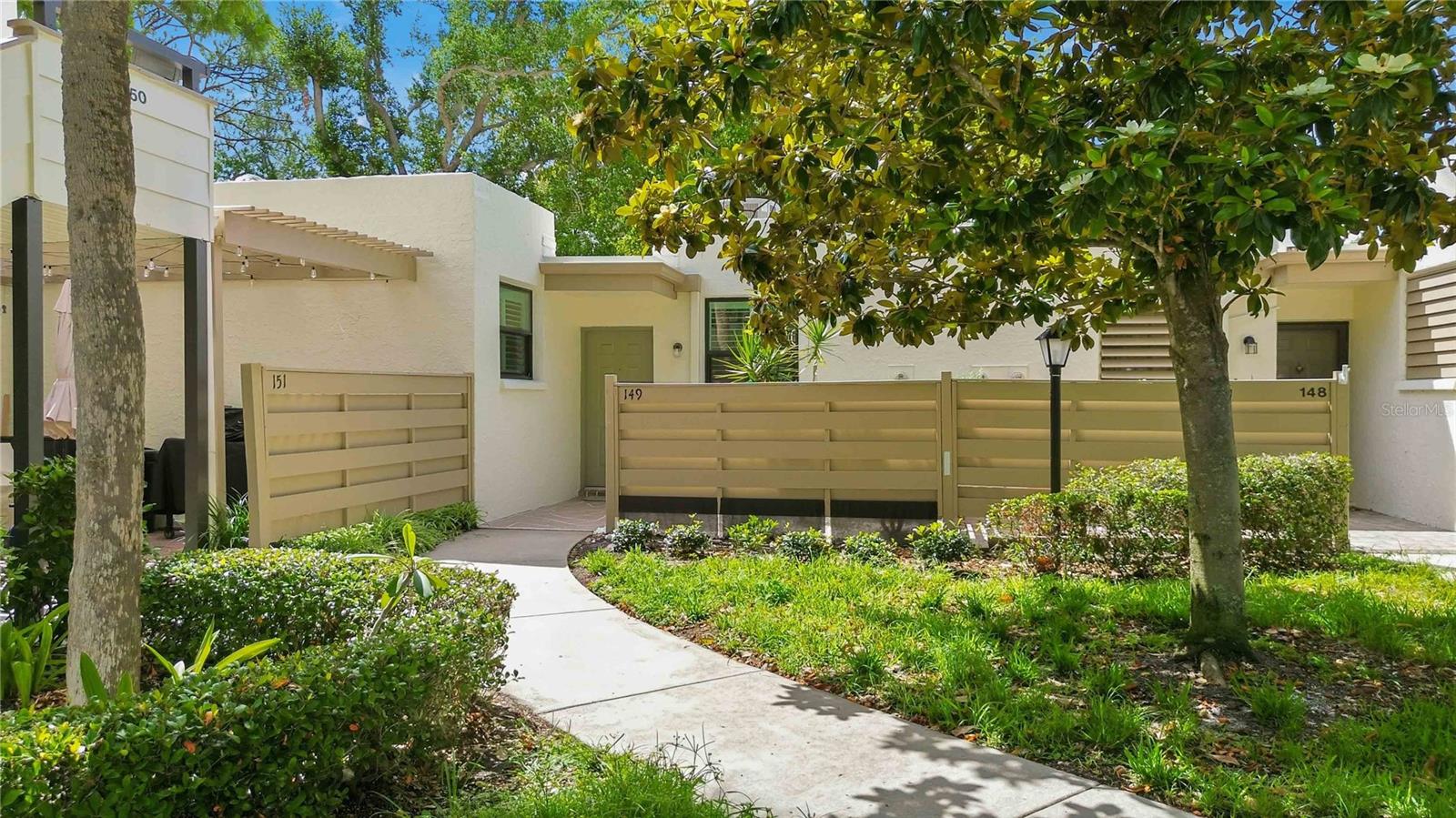 Welcome to one of the most desirable turn-key furnished villas in Wildewood Springs—where lush, mature landscaping and a serene bird sanctuary setting create a truly one-of-a-kind environment.

This ideal 3 bedroom, 2 bathroom villa is perfectly positioned on a private corner, offering a rare and highly coveted oversized courtyard, beautifully paved with bricks and provides incredible shade—perfect for relaxing, entertaining, or enjoying peaceful mornings surrounded by nature. Just steps beyond your courtyard, you’ll find one of the community’s many sparkling pools, making it feel like an extension of your own backyard.

Inside, this home has been completely renovated from top to bottom with thoughtful, high-end updates throughout including fresh interior paint. The stunning kitchen has been fully remodeled and features stainless steel appliances, modern cabinetry, quartz countertops, under-cabinet lighting and stylish finishes that elevate the entire space. Hurricane impact windows have been newly installed (April 2026) and are beautifully complemented by brand new plantation shutters, adding both elegance and peace of mind.

With no carpet anywhere, the home offers a clean, cohesive feel and easy maintenance. The spacious screened L-shaped lanai provides even more room to unwind, complete with a large storage closet for added convenience.

The front courtyard has been enhanced with beautiful limestone rock, creating the perfect setting for your morning coffee or evening wind-down. And with no one living above you, you’ll enjoy added privacy and quiet that’s hard to find.

This is low-maintenance living in one of the most picturesque communities around—where every detail has already been done for you.