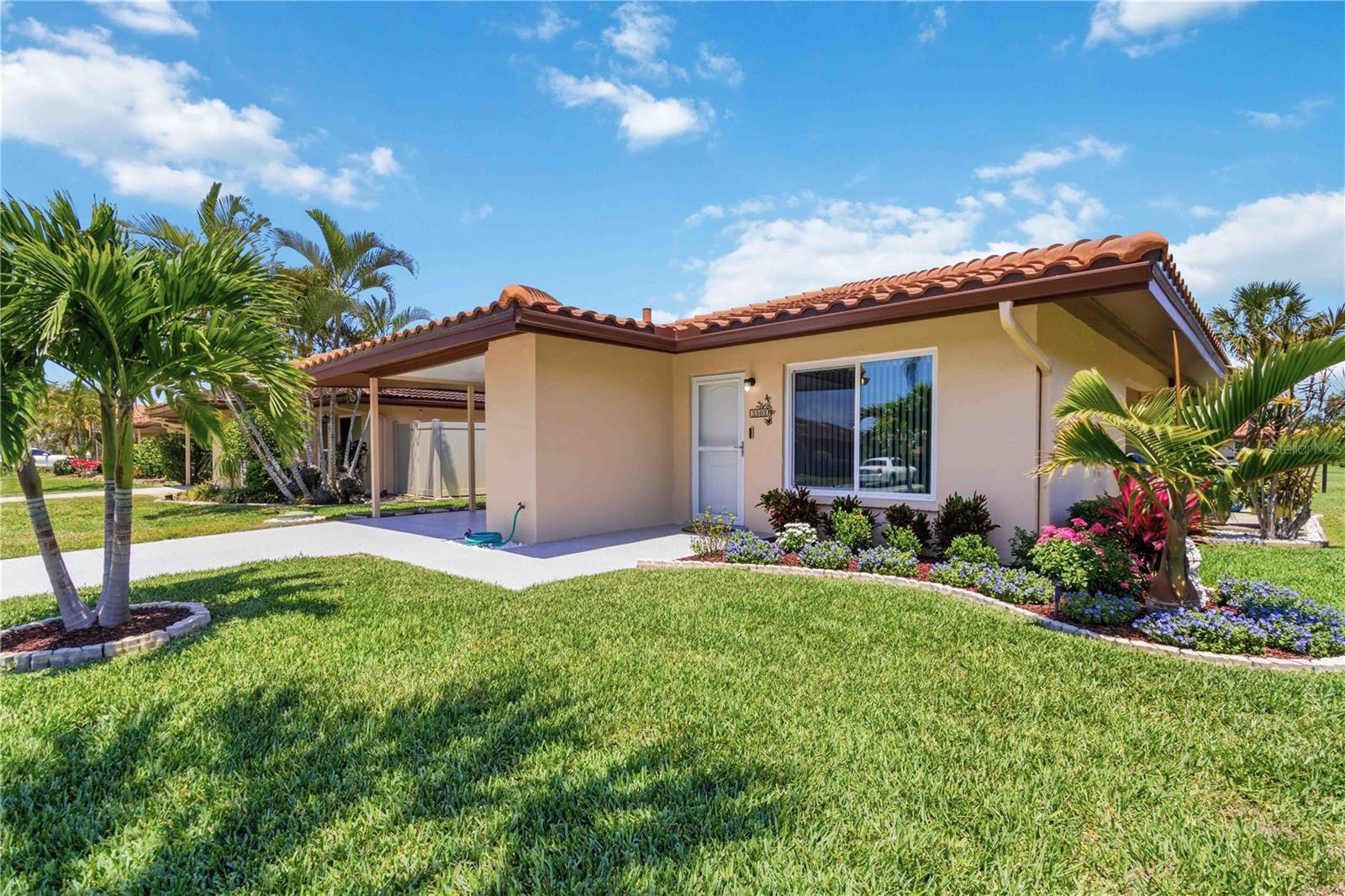 Welcome to this beautifully updated 2-bedroom, 2-bath home that has been thoughtfully renovated inside and out with quality upgrades and attention to detail throughout. From the moment you arrive, you’ll appreciate the new driveway and front walkway completed in 2025, fresh exterior paint, updated landscaping with low-maintenance plants and rubber mulch, and hurricane-impact windows and exterior doors for added peace of mind.
Inside, the home showcases extensive 2022 renovations including luxury vinyl plank flooring in the living room, dining room, office, and primary bedroom, updated tile flooring in the kitchen and bathrooms, all new interior doors with brushed nickel hardware, upgraded moldings and trim, and custom blinds throughout. The popcorn ceilings were removed, retextured, and freshly painted, creating a clean and modern feel.
The kitchen features high-end appliances, added cabinetry for extra storage, a new garbage disposal, built-in blinds on the kitchen door, and upgraded electrical improvements including additional GFI outlets. Both bathrooms have been beautifully remodeled with updated cabinetry, tile work, lighting, mirrors, plumbing fixtures, raised toilets, and brushed nickel finishes.
Additional upgrades include a new HVAC system with air purification in 2021, new A/C with built-in heater and thermostat, upgraded insulation, updated plumbing and electrical work, multiple ceiling fans with remotes, smart hot water heater (2025), security cameras, and a Murphy bed with custom office storage. The home is also pet-free and smoke-free.
Enjoy maintenance-free Florida living with HOA amenities that include lawn maintenance, cable TV, a heated community pool, clubhouse, and shuffleboard courts—perfect for enjoying the relaxed Florida lifestyle year-round.
INCLUDED FURNISHINGS- SECTIONAL COUCH, 86" TELEVISION, DINING ROOM TABLE AND CHAIRS, MURPHY BED AND CABINETRY!!! EASILY MOVE INTO YOUR NEW HOME!