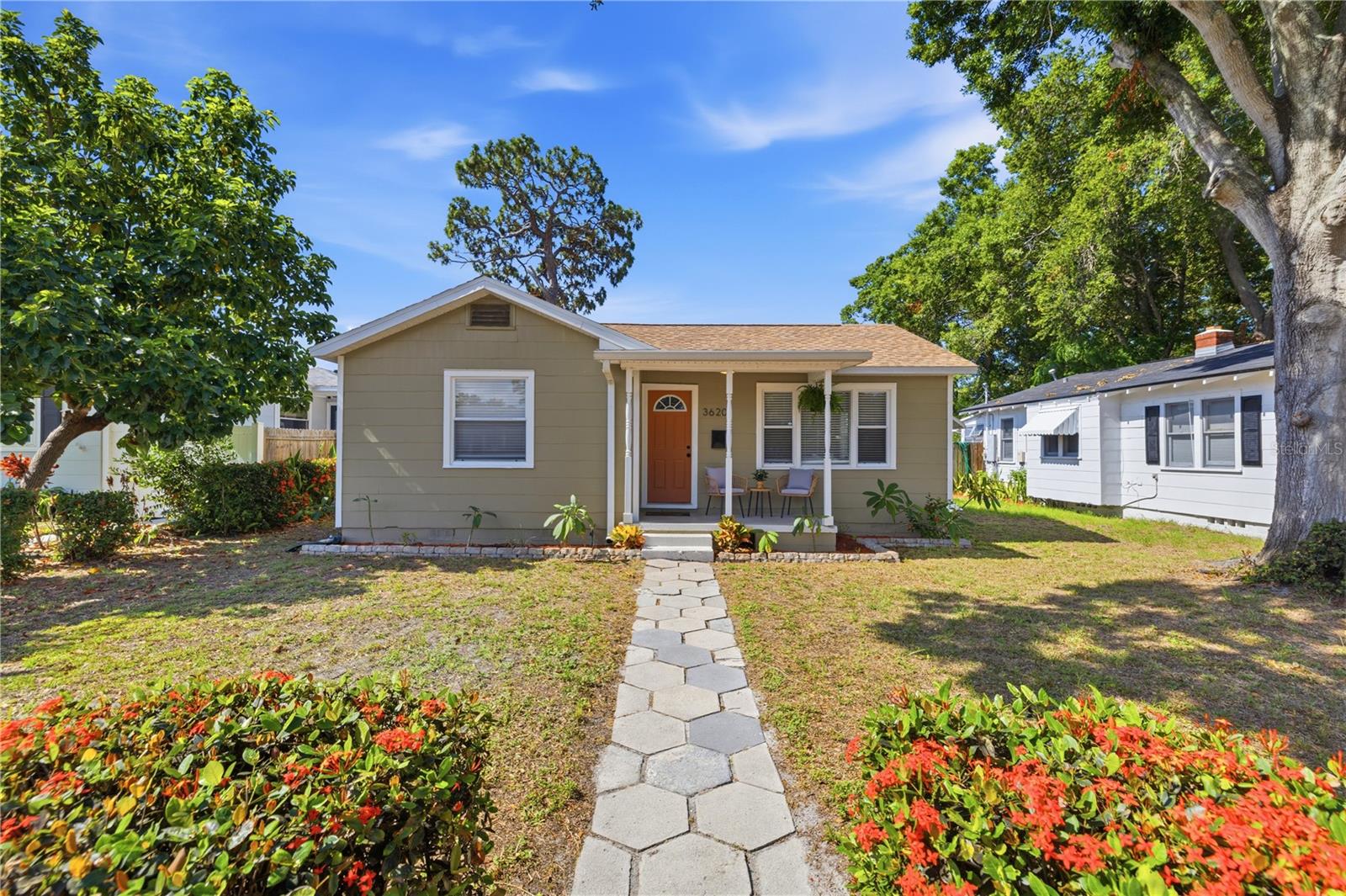 Turnkey and perfectly positioned in desirable Flood Zone X, this beautifully updated bungalow offers the ideal blend of charm, comfort, and convenience. Tucked away on a serene brick-lined street, this move-in ready home welcomes you with an inviting front porch—the perfect place to enjoy your morning coffee and start the day. Step inside to a bright and welcoming living room that flows effortlessly into the beautifully updated kitchen, featuring solid wood cabinetry, stone countertops, and a cozy dining area that’s perfect for everyday living and entertaining. Both bedrooms are generously sized and filled with natural light, while the updated bathroom, new flooring, and fresh interior paint create a clean, modern feel throughout—allowing you to simply unpack and enjoy. For added peace of mind, the home also features a 2020 roof and a 2023 HVAC system. Out back, the covered porch is ideal for relaxing or hosting family and friends, while the fully fenced backyard is a true blank canvas. With plenty of room for a pool, lush landscaping, or your own private backyard retreat, the possibilities are endless. An added bonus: the property meets the criteria to add an Accessory Dwelling Unit (ADU), offering exciting potential for multigenerational living, a private guest house, a home office, or additional rental income (buyer to verify all zoning and permitting requirements with the City of St. Petersburg). Whether you’re a first-time homebuyer, looking to downsize, or searching for a turnkey investment, this home is ready to welcome its next owner. Enjoy an unbeatable central location just minutes from vibrant Downtown St. Petersburg, award-winning Gulf beaches, Tampa, and Tampa International Airport, making commuting and weekend adventures a breeze. As an added bonus, qualified buyers may receive up to 1.25% of the loan amount toward closing costs or an interest rate buy-down when financing through Eads Mortgage, making homeownership even more affordable. Schedule your private showing today!