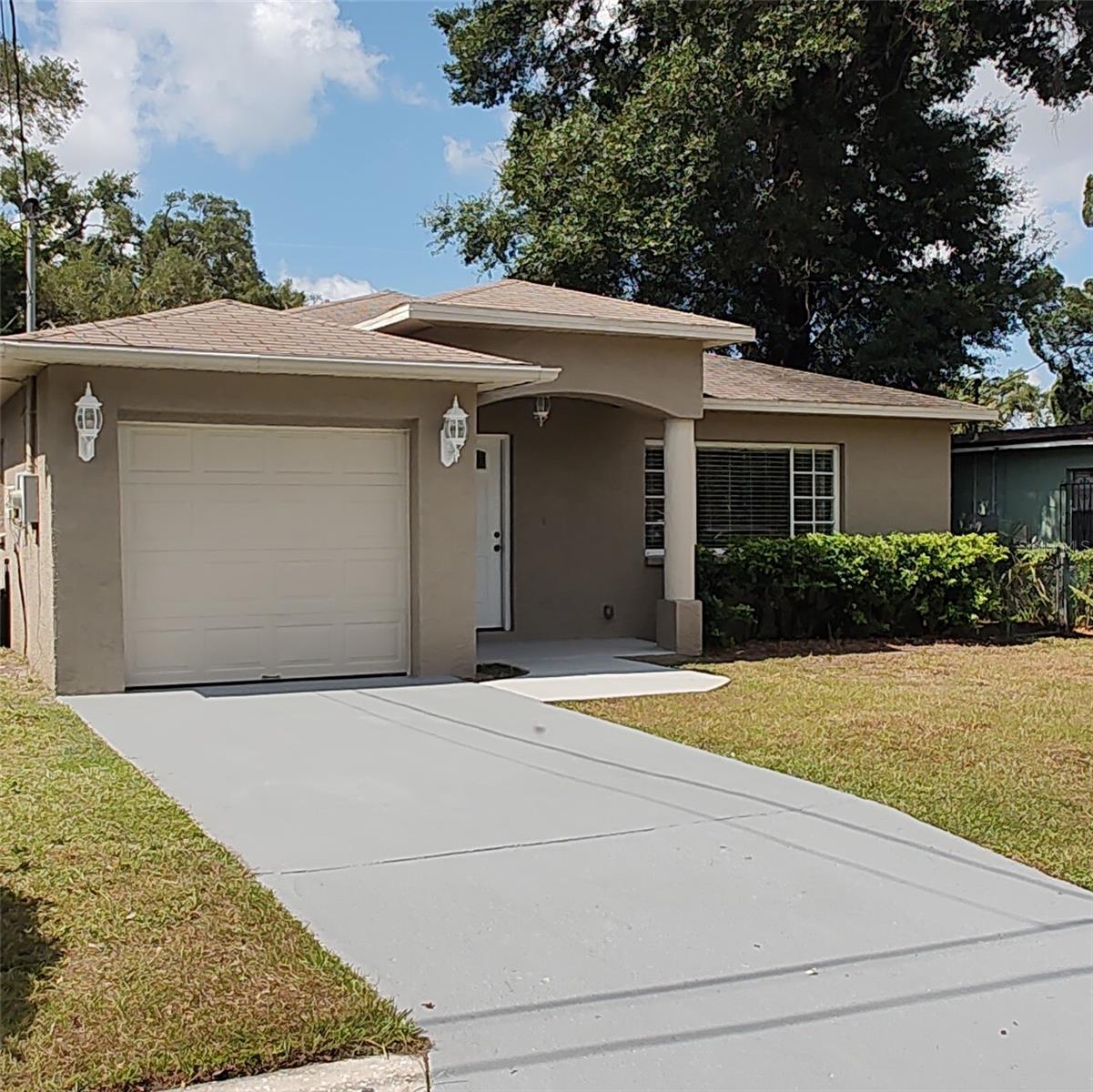 THIS LOVELY, BRIGHT AND SPACIOUS 3 BR, 2 BA, ATTACHED GARAGE HOME WITHIN TAMPA CITY LIMITS NEAR PROXIMITY TO DOWNTOWN TAMPA, BENCHMARK ARENA, RAYMOND JAMES STADIUM, YBOR CITY, TAMPA INTERNATIONAL AIRPORT, SCHOOLS, SHOPPING AND ALL THE MAJOR EXPRESSWAYS I4, I75, LEROY SELMON EXPWY, ETC. THIS NEWLY REMODELED HOME FEATURES FRESHLY PAINTED INTERIOR THROUGHOUT HOME, NEW LUXURY VINYL FLOORING IN ALL 3 BEDROOMS AND CLOSETS, ALL BEDROOMS ARE GOOD SIZE, NEWLY INSTALLED 5 1/4" LUXURY BASEBOARDS THROUGHOUT HOME, NEW 2" BLINDS ALL WINDOW, NEW CEILING FANS AND LIGHT FIXTURES ALL ROOMS, BEAUTIFULLY INSTALLED KITCHEN CABINETS AND QUARTZ COUNTER-TOPS, ALL BRAND NEW STAINLESS KITCHEN APPLIANCES WITH NICE GLASS TOP ELECTRIC STOVE, NEWLY INSTALLED VANITIES AND QUARTZ COUNTER-TOPS IN MASTER BATHROOM AND HALL BATHROOM, INSIDE UTILITY ROOM FOR LAUNDRY CONVENIENCE, NEW ENTRY FRONT DOOR AND REAR EXTERIOR DOOR, FENCED YARD AND MORE!!! THIS MOVE-IN HOME IS READY FOR A NEW FAMILY!!! PLEASE CALL LISTING AGENT AND MAKE APPOINTMENT TO SHOW THIS BEAUTIFUL HOME!!!