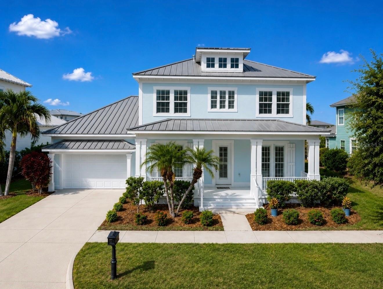 Luxury Coastal Waterfront Home! Experience elevated coastal living in this stunning waterfront residence featuring a private dock with a 13,000 lb boat lift and direct access to beautiful Tampa Bay - perfect for boating enthusiasts and sunset cruises. Designed with a bright, airy coastal aesthetic, this exceptional two-story home offers soaring ceilings, abundant natural light, and an effortless indoor-outdoor lifestyle. This 3548 square foot home offers 4 spacious bedrooms, 3.5 bathrooms, a private office, and a formal dining room. The thoughtfully designed floor plan blends elegance with everyday comfort. Rich bamboo wood flooring flows throughout the home, while expansive living spaces and a versatile loft area provide room to relax, entertain, or gather. The luxurious primary suite is a private retreat featuring an oversized walk-in closet and a spa-inspired bath with an impressive walk-in shower. The chef's kitchen is appointed with stainless steel appliances, generous prep space, and seamless flow into the main living areas. Step outside to the expansive covered lanai overlooking tranquil water views, creating the perfect backdrop for morning coffee or evening entertaining. Completing the home is a spacious 3-car tandem garage and the rare convenience of true waterfront living with quick bay access. This extraordinary coastal home offers the ideal balance of luxury, comfort, and boating lifestyle.