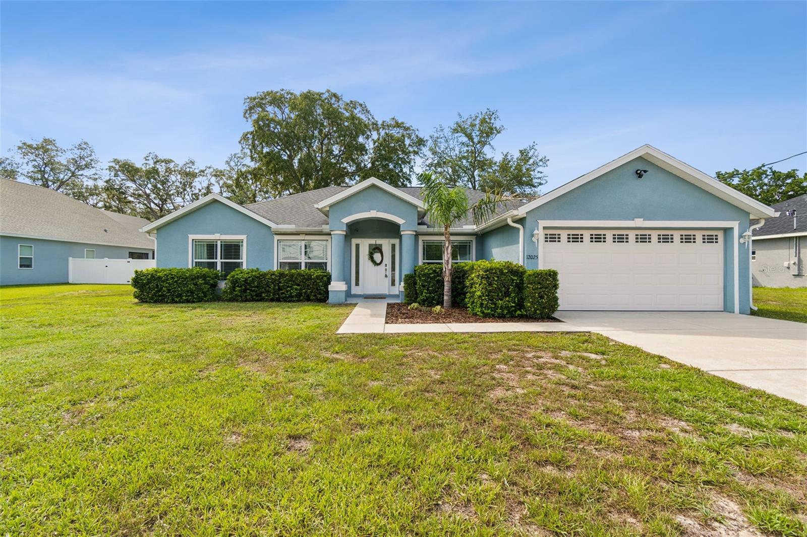 Step inside and experience a home that IS BRAND NEW from the inside. This stunning 2017 Hartland Home sits on a spacious HALF-ACRE lot in the highly desirable Royal Highlands, complete with a fully cleared and fenced backyard—your private Florida oasis.

The moment you enter, you’re greeted by new luxury vinyl plank flooring, vaulted ceilings, 5¼” BASEBOARDS, DOUBLE PANED WINDOWS and an open, airy floor plan that flows beautifully from room to room. The gourmet kitchen is a true showstopper, featuring QUARTZ countertops, tile accents, top-tier appliances, and 2 FULL PANTRIES for exceptional storage.

A dedicated dining area offers flexibility as a formal space or cozy sitting room, while the 4th bedroom with closet doubles perfectly as a home office. The great room off the kitchen is ideal for movie nights or game day gatherings, and the additional breakfast nook provides the perfect spot for morning coffee.

The Owner’s Suite is tucked privately on one side of the home and boasts 2 walk-in closets, DUAL VANITIES, and a spacious WALK-IN-SHOWER. The opposite wing features two generous bedrooms and a full bath with a tub/shower combo.

Step through the French doors to your covered lanai, overlooking a QUARTER-ACRE of CLEARED PRIVATE, NEWLY FENCED yard—ready for pets, play, or your dream outdoor retreat. With NEW VINYL FLOORING, INTERIOR PAINT, CABINETS with SOFT-CLOSE Drawers, APPLIANCES, and thoughtful upgrades throughout, this home truly shines.

Welcome home to Royal Highlands, living at its finest.