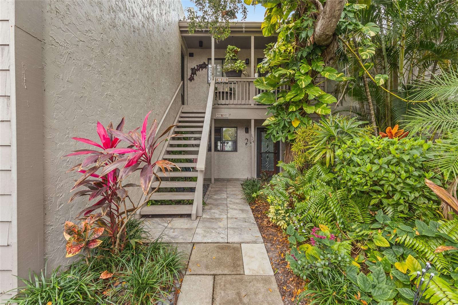 Your Pelican Cove drive begins when the front gate lifts and the beauty of Pelican Cove unfolds. The main living area overlooks the harbor and has a rear, private deck, providing the sought-after Florida indoor/outdoor lifestyle. This condo has an updated and ready for its new owners.  A canopy tree community on Sarasota Bay, Pelican Cove is a 75-acre gated, vibrant, waterfront community nestled among manicured tropical foliage truly offering something for everyone. Abundant amenities include an 86-slip boat harbor with sailboat water, excellent rates, and a launch dock for kayaks and canoes, 6 heated swimming pools, hot tub, 3 clubhouses, 4 lighted tennis courts, Pickleball, shuffleboard, basketball court, dog walk area, 5.5 miles of walking trails and boardwalks as well as fishing gazebos, water exercise classes, exercise facilities, 2 art studios and a pottery classroom. Take classes at Pelican Cove University or join one of the more than 37 clubs, including photography, fiber art, bike riding, yoga, Tai Chi, culinary arts, and card clubs. Woodworking, sculpting and evening jazz & classical music concerts round out the active lifestyle.