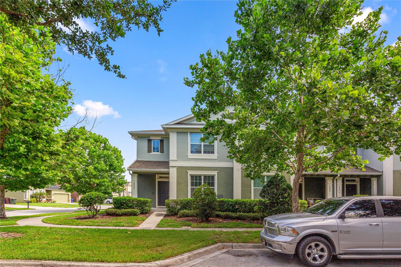 Prepare to fall in love with this beautifully upgraded 4-bedroom, 2.5-bath corner-unit townhome that perfectly blends modern elegance with everyday comfort. From the moment you step inside, you'll appreciate the brand-new luxury laminate flooring throughout the first floor, plush upgraded carpet with premium padding upstairs, new window blinds throughout the home, and ceiling fans thoughtfully installed throughout for added comfort.

The showstopping kitchen is truly the heart of the home, featuring stunning black-and-white quartz countertops and a breathtaking waterfall-edge quartz island that creates a striking focal point. The space is further enhanced by a gorgeous glass tile backsplash, 42-inch soft-close cabinetry, a convenient Lazy Susan, a built-in seasoning cabinet, a stainless-steel farmhouse sink, stainless steel LG Smart appliances, and a freestanding wine cooler. The gourmet kitchen also boasts a sleek LG induction range for precise, energy-efficient cooking and an LG Smart refrigerator that produces premium Craft Ice perfect for entertaining. Elegant gold fixtures and coordinating gold outlet covers complete the designer-inspired finishes, making this kitchen as beautiful as it is functional.

Retreat to the spacious primary suite, complete with a private en-suite bath and an oversized walk-in closet, offering the perfect combination of comfort and privacy. Three additional generously sized bedrooms provide flexibility for guests, a home office, or additional living space.

Situated on a desirable corner lot, this home offers additional outdoor space ideal for relaxing or entertaining. The covered rear patio provides a comfortable place to unwind and enjoy Florida's beautiful weather, while the spacious two-car garage offers plenty of room for parking and storage.

Residents enjoy outstanding community amenities, including a resort-style swimming pool, fitness center, playground, dog park, scenic lakes, and beautifully maintained common areas. The HOA also includes lawn maintenance, allowing you to enjoy a low-maintenance lifestyle.

Ideally located with convenient access to the Florida Turnpike and State Road 417, this exceptional townhome offers easy commuting while placing you just minutes from shopping, dining, entertainment, and everyday conveniences.

Thoughtfully upgraded throughout and meticulously maintained, this move-in-ready home offers the perfect combination of style, comfort, and convenience. Schedule your private showing today and experience all this exceptional property has to offer!