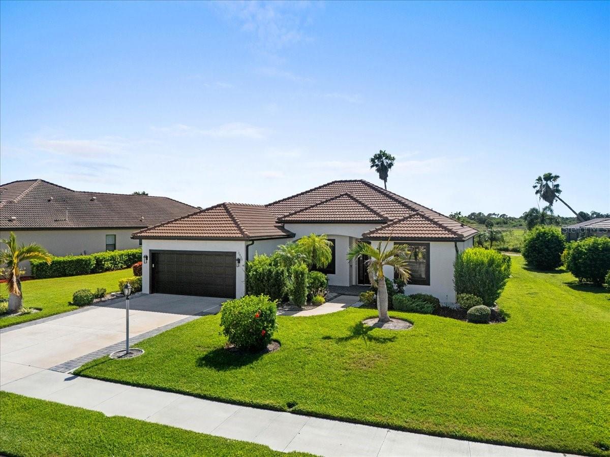 Welcome to this meticulously maintained POOL home in the highly sought-after gated community of Bobcat Trail, offering the perfect blend of comfort, functionality, and the Florida lifestyle. Featuring 3 bedrooms plus a dedicated office, 2 bathrooms, and 2,052 square feet of living space, this home is situated on an OVERSIZED LOT and is close to I-75, shopping, dining, world class fishing, golf courses, and Southwest Florida's beautiful Gulf beaches. Enjoy all the amenities of a gated community with an incredibly LOW HOA fee of just $120/year, and no flood insurance is currently required (Flood Zone X).
Step inside through the glass entry doors to discover an open, light-filled floor plan featuring vaulted ceilings, recessed lighting, and tile and luxury vinyl flooring throughout. The spacious living room seamlessly connects to the screened lanai through sliding glass doors, creating the perfect indoor-outdoor living experience for entertaining family and friends.
The beautifully appointed kitchen has been refreshed with NEW COUNTERTOPS and FAUCETS, complemented with stainless steel appliances, a gas range with double ovens, white cabinetry, a breakfast bar, generous counter space, an UPDATED MINI BAR, and a pantry for added storage.
The split-bedroom floor plan provides privacy for both owners and guests, while the dedicated office with a NEW CUSTOM BUILT-IN WORKSPACE creates the ideal setting for working from home. The spacious owner's suite offers private access to the lanai, two walk-in closets, and an updated ensuite bathroom featuring dual vanities, a large walk-in tiled shower, and a private bathroom.
Step outside to your own private backyard retreat featuring a heated saltwater pool overlooking peaceful pond views. Recent upgrades include a NEW GAS POOL HEATER, NEW SALT CELL, and NEWLY INSTALLED PAVERS extending the walkway along the side and backyard, creating the perfect space for relaxing or entertaining year-round.
Additional improvements include a 2023 CONCRETE TILE ROOF, NEW WATER HEATER, FRESHLY PAINTED EXTERIOR and INTERIOR, hurricane shutters, rain gutters, and numerous thoughtful updates that allow the next owner to move right in with confidence.
Residents of Bobcat Trail enjoy a gated entrance, community pool, fitness center, sidewalks, and beautifully maintained grounds, all while being conveniently located near Wellen Park, CoolToday Park, downtown Venice, Punta Gorda, top-rated golf courses, world class fishing, waterfront dining, and the white-sand beaches of Englewood, Manasota Key, and Boca Grande.
This move-in-ready home offers the ideal combination of modern updates, low-maintenance living, resort-style outdoor space, and one of the best values in North Port.