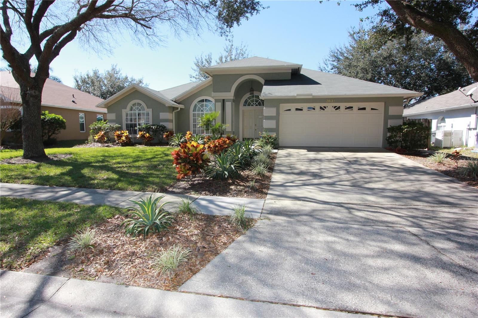 3/2, 2 Car Garage, Single Family Pool Home, Split Floor Plan, Living Room, Family Room, Dining Room, Eat in Kitchen, Open Kitchen with Breakfast Bar and Appliances Included: (Stainless Steel) Stove, Refrigerator, Microwave, Dishwasher and Disposal, Inside Utility Room with Washer and Dryer Hookups, Master Bathroom has Dual Sinks and Separate Garden Tub and Shower, Hardwood and Tile Throughout Home, Security System, Vaulted Ceilings, Walk in Closets, Screened Patio and Pool, Fenced Backyard, Fitness Center (Available with Membership Fee)