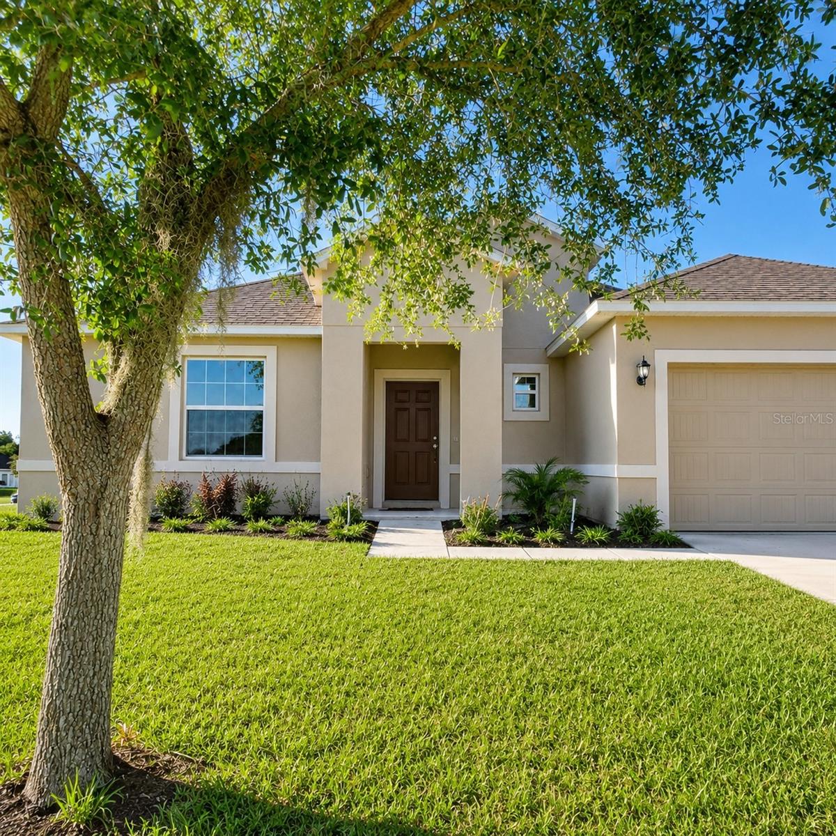 Virtually Staged. Welcome to 15548 Gemini Drive in Mascotte, a well-maintained 4-bedroom, 2-bath home built in 2017. Offering approximately 1,950 square feet of living space, this single-story residence features an open-concept floor plan designed for both everyday living and entertaining. The spacious kitchen overlooks the living and dining areas, creating a seamless flow throughout the main living spaces.
The split-bedroom layout provides added privacy, with a generously sized primary suite featuring a walk-in closet and an en-suite bath. Three additional bedrooms provide flexibility for family, guests, or a home office. Additional features include a two-car attached garage, an indoor laundry room, central heating and air conditioning, and a spacious backyard with room to personalize for outdoor living, gardening, or recreation. Built in 2017, this home offers the benefits of newer construction and is conveniently located near shopping, dining, parks, schools, and major roadways, providing easy access to Clermont, Orlando, and surrounding Central Florida communities. Whether you're looking for your first home, additional space, or a newer property with a functional layout, this home offers comfort, versatility, and the opportunity to make it your own.