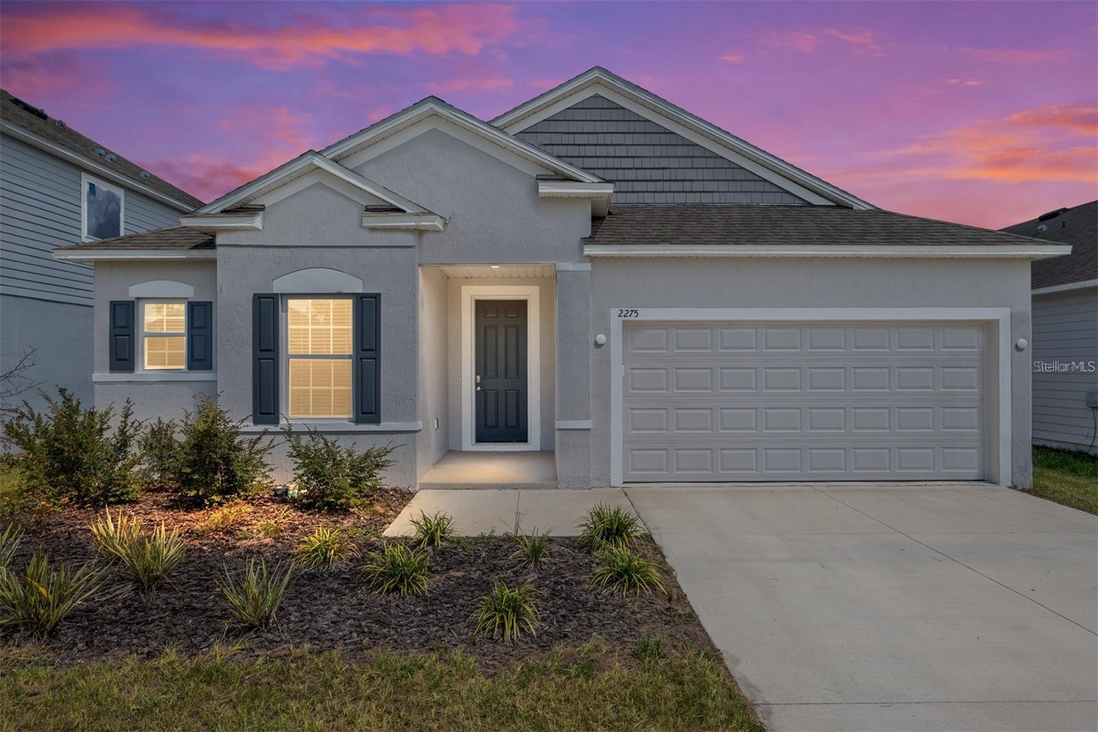Why wait on construction times when you can move right into this like new home in Avalon Woods in Newberry. Bright, spacious, and with an open-concept layout, it features tile flooring throughout the main living area and carpet in the bedrooms. Upon entering, you will find 2 bedrooms and a full bathroom next to the foyer, while the primary suite is located off the living room. This home offers numerous modern upgrades throughout its spaces to make living in and enjoying your home easier than ever. Outside, enjoy the luxury of a screened patio overlooking the backyard. Close to parks and entertainment options throughout the community, top-tier schools, 25 minutes from Gainesville, and 15 minutes from the Publix in Jonesville, with a brand-new Publix just around the corner. Make this home yours and embrace the charm, convenience, and everything Newberry has to enjoy.