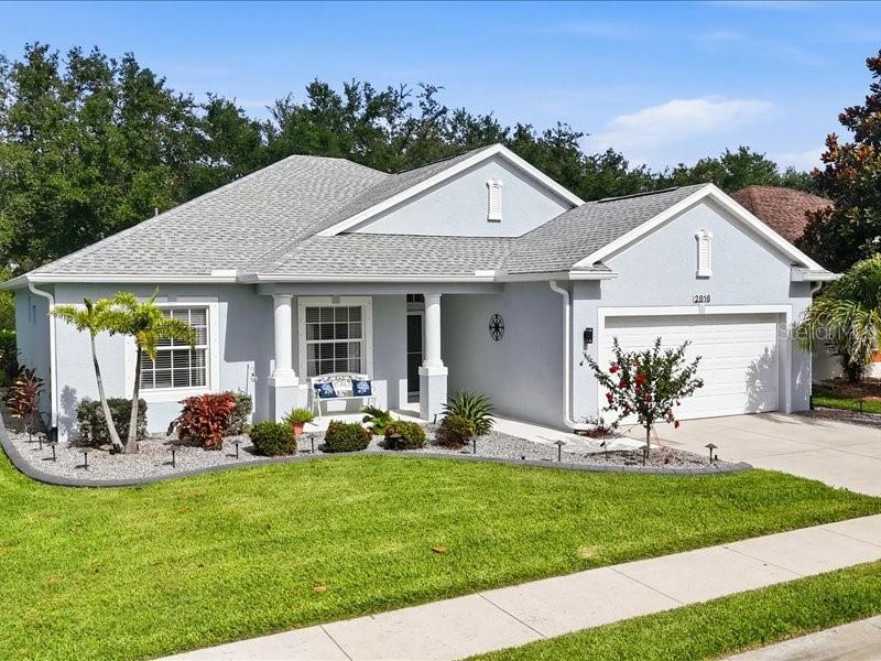 Beautifully maintained and tastefully furnished, this 2-bedroom plus den home is located in the desirable gated community of Suncoast Lakes. The open floor plan offers a comfortable great room design with tile flooring throughout, a dinette area, and a convenient butler’s pantry for extra storage and serving space.

The home is light, welcoming, and move-in ready, with furnishings that complement the easy Florida lifestyle. Enjoy relaxing on the screened lanai or spending time outdoors on the paver patio overlooking the private backyard.

Suncoast Lakes offers a gated setting with community amenities including a pool, making it a wonderful choice for year-round living or a seasonal Florida retreat. This well-cared-for home offers comfort, privacy, and low-maintenance living in a convenient location with shopping and medical facilities close by.