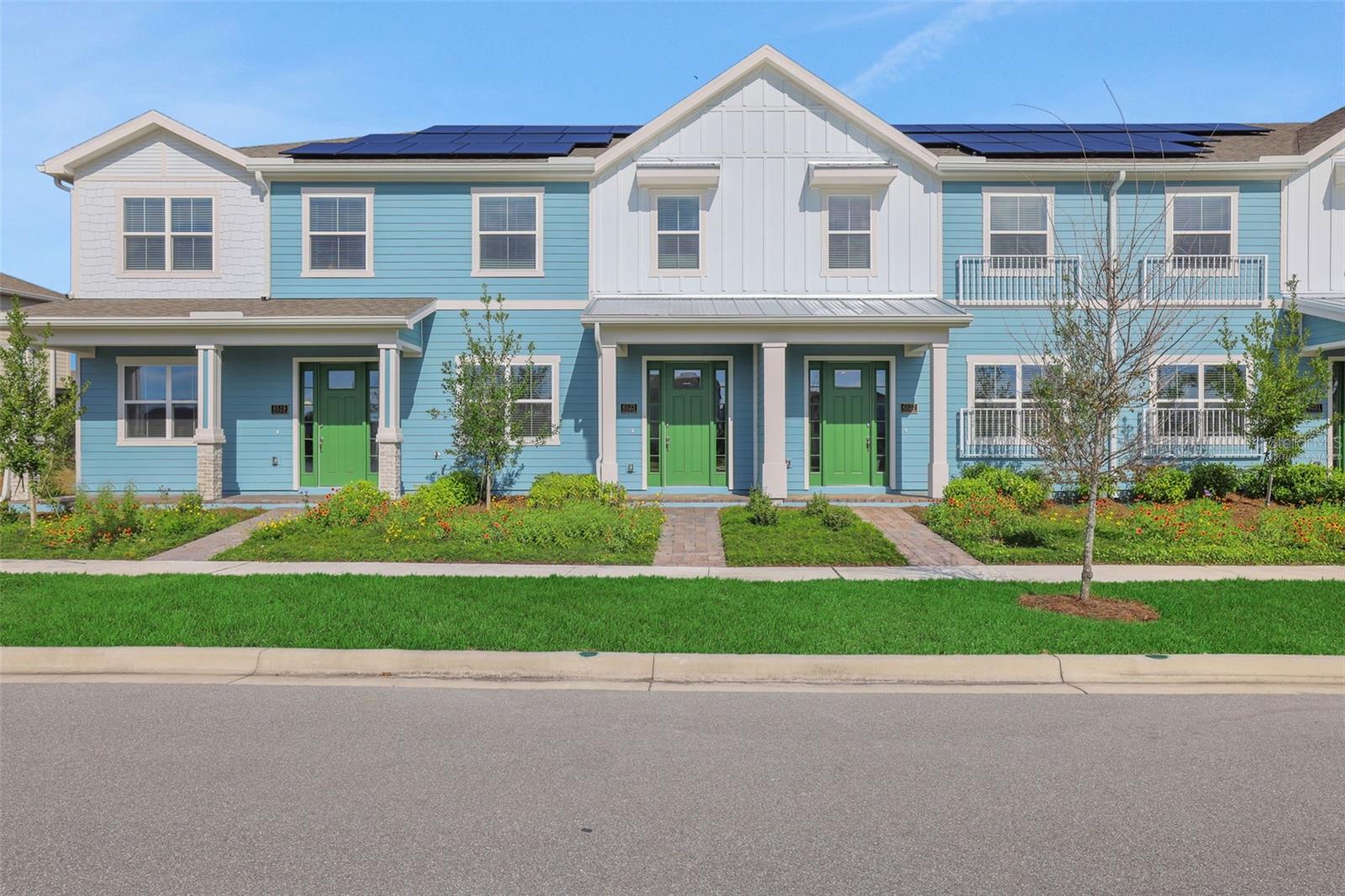 Virtually Staged. Welcome to this stunning 3-bedroom, 2.5-bath townhome located in the highly sought-after community of Sunbridge. Designed for modern living, this home features an open-concept layout filled with natural light, a spacious courtyard perfect for outdoor entertaining, and a detached 2-car garage with a private driveway. The gourmet kitchen is a chef’s dream with quartz countertops, 42" cabinets, stainless steel appliances, and a large center island. 
Upstairs, you’ll find three comfortable bedrooms, including a luxurious owner’s suite with a walk-in closet and spa-inspired bath. Enjoy the convenience of low-maintenance living while taking advantage of Sunbridge’s resort-style amenities, scenic trails, and close proximity to Lake Nona’s shopping, dining, and entertainment. This home blends comfort, style, and location—making it the perfect place to call your own!
