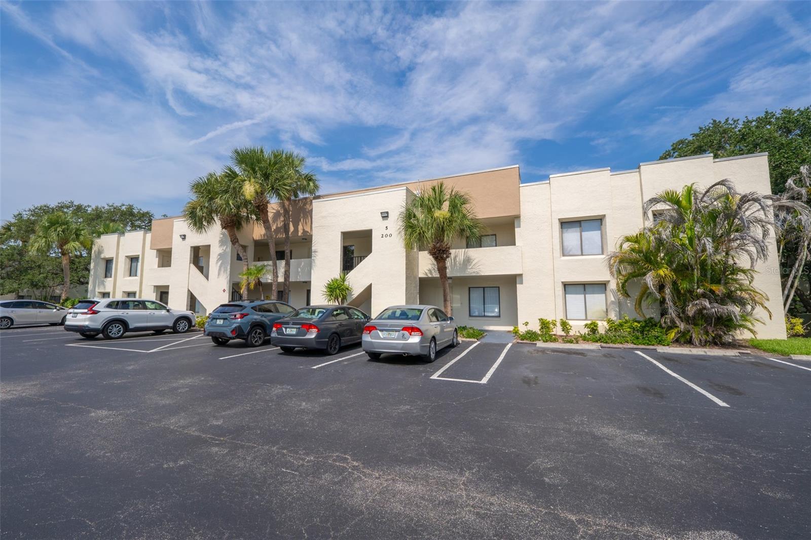 Banana River Waterfront Living at Canaveral Bay! This 2nd-Floor 2-bed, 1-bath unit features an open living/dining floor plan and abundant natural light. Upgrades include a full remodel in 2018, luxury vinyl plank flooring and high-end carpet in both bedrooms. The spacious eat-in kitchen boasts an expansive breakfast bar, casual dining nook, stainless steel appliances, granite countertops, and sliders to the newly screened private balcony patio. The primary features sliders to the patio and ample closet space. Convenient in-unit laundry, 2022 HVAC and 2024 hot water heater complete the package. Residents enjoy a sparkling heated pool, spa, sauna, tennis/pickleball, kayak storage, and direct river access. Convenient location less than a mile from the beach, 1.5 miles to the Cocoa Beach Pier and Port Canaveral cruise ships, shopping, and dining. With a 1-month rental minimum, this is the perfect vacation retreat, investment, or year-round coastal home. Live the Space Coast lifestyle!