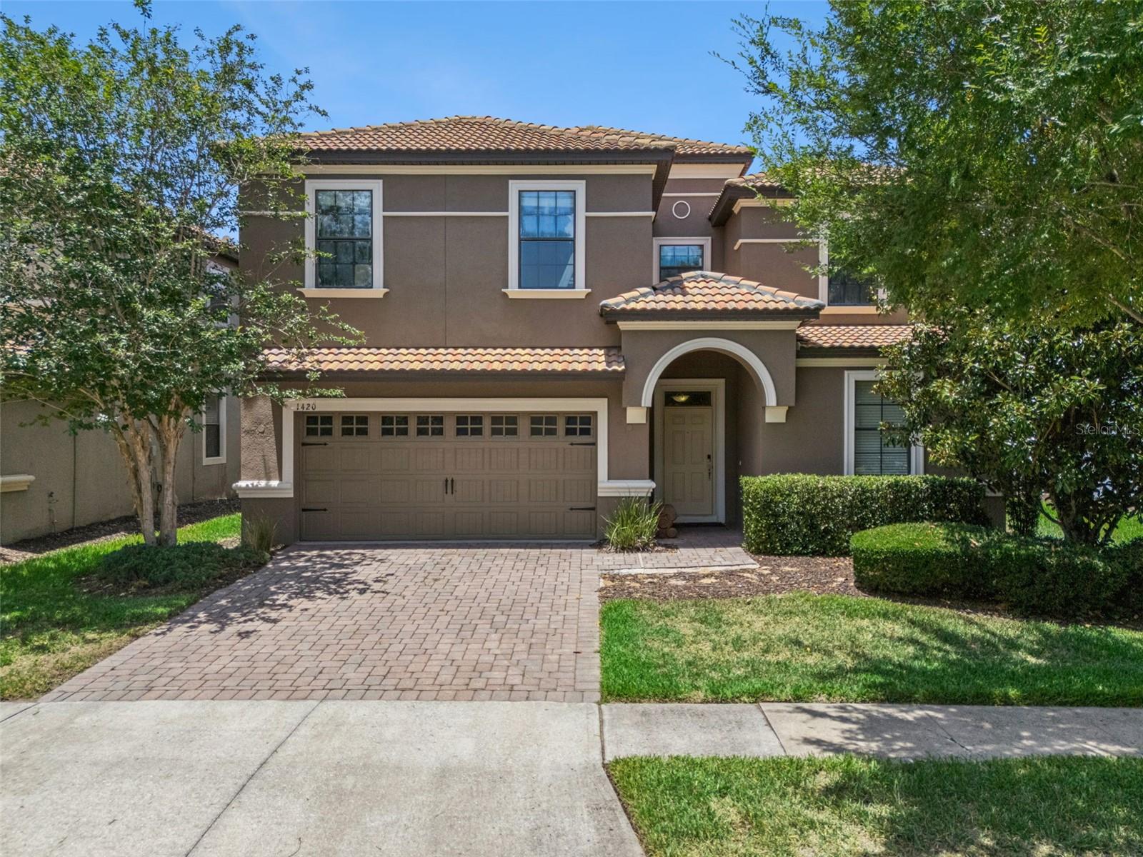 Investors or vacation home buyers searching for a fully furnished, turnkey vacation rental property near Disney will immediately recognize the value of this 9-bedroom, 5-bath home located within the highly sought-after golf and resort community of ChampionsGate. Situated inside a 24-hour guard-gated neighborhood that allows short-term rentals, this property offers one of the rarest combinations in Central Florida: a spacious luxury vacation home, resort-style amenities, golf access, and the flexibility to generate rental income while enjoying it as your own personal Florida retreat. Designed for large families and groups, the home features high ceilings, an open-concept floor plan, a modern kitchen with an oversized breakfast bar, and a desirable first-floor primary suite. No carpet anywhere, all LVP! Upstairs, a massive loft creates additional gathering space, while 7 additional bedrooms and two Jack-and-Jill bathrooms provide privacy and flexibility for guests. Step outside to your own screened private pool and spa that has remote automation, one of the most requested amenities among vacation renters visiting the Orlando area. Whether hosting family and friends or welcoming future guests, the outdoor living space creates the true Florida lifestyle experience that travelers seek when booking accommodations near Disney and other world-famous attractions. Unlike many homes in the area, this property is not currently operating as a short-term rental, giving the next owner a unique opportunity to create a customized vacation rental brand, select their own management strategy, and design the guest experience from the ground up. With the home being sold fully furnished, startup costs can be minimized, allowing owners to focus on maximizing the property's potential from day one. Location is another standout feature. This rare home is within walking distance of the Oasis Club, widely recognized as one of The Premier resort amenity centers in Central Florida. Guests enjoy access to the 10,000-square-foot clubhouse featuring onsite restaurants and bars, a fitness center, movie theater, arcade and game room, resort-style pools, a 1,000-foot lazy river, tiki bar, snack bar, sand volleyball, private cabanas, and spa. The combination of a private pool home and world-class resort amenities is a major draw for vacationers seeking an elevated Orlando experience. Ownership is made even easier through HOA services that include lawn care, trash, security monitoring, cable, internet, and phone helping simplify management whether the home is used as a personal vacation residence, investment property, or both. Located approximately 22 minutes from Disney's Magic Kingdom, with convenient access to Universal Orlando Resort, SeaWorld, LEGOLAND shopping, dining, Interstate 4, and Orlando International Airport, the property is ideally positioned to attract year-round visitors from across the United States and around the world. Zoned for both short-term and long-term rental use, this vacation home offers exceptional flexibility for investors seeking an income-producing property near Disney, second-home buyers looking for a Florida getaway, or those wanting the best of both worlds. Opportunities to own a fully furnished 9-bedroom short-term rental property within walking distance of the Oasis Club are limited. Schedule your private showing today and discover why ChampionsGate remains one of the most desirable vacation rental investment communities in Orlando.