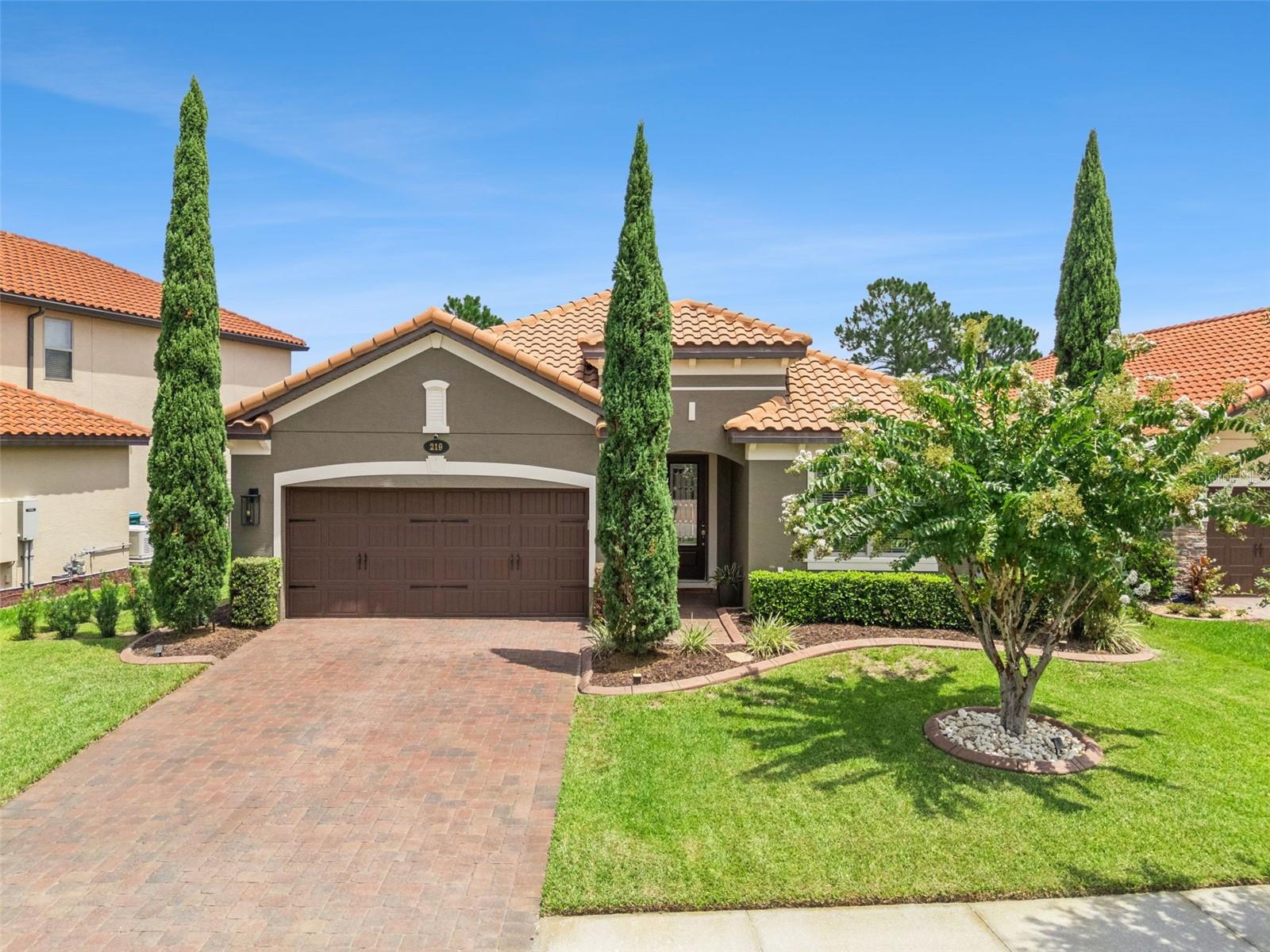 This welcoming 4-bedroom, 3-bathroom pool home in the gated Riviera Bella community is loaded with upgrades and is move-in ready! Built in 2016 with 2,211 sq ft on a big 7,623 sq ft lot, it's the perfect blend of style and comfort for everyday living.

Step inside and notice the custom details right away: beautiful wainscoting in the entry, tray ceilings in the primary bedroom, and specialty box molding in the nursery. Built-in cabinetry and shelving in the living room feature an electric fireplace with integrated lighting, creating a cozy spot for family nights. The kitchen is a standout with granite countertops, a stylish backsplash, gas appliances, under and over cabinet and pendant lighting, plus an upgraded dry bar with glass-front cabinets, extra lighting, and a wine refrigerator—great for casual get-togethers.

Master bathroom has quartz countertops; secondary bathroom both have granite countertops and all the bathrooms have comfort height vanities (no builder-grade lows here!). You'll also find tile flooring in all bedrooms, ceiling fans throughout, French-door closets with tailored shelving and automatic lighting in the nursery, and one of the bedrooms is currently used as a home office with built-ins—offering a flexible work-from-home setup. Plus, there is storage everywhere, making it so easy to stay organized.

Outdoors, relax in your own backyard oasis with a saltwater pool with gas heater, privacy hedges, landscape curbing in the front yard, and two patio TV hookups ready for movie nights or entertaining. Practical upgrades make life easier: Generac whole-home generator, brand-new water heater (2026), garage A/C, whole-home water filtration, and a well-organized garage with overhead storage racks and insulation. Many of these improvements are recent, so everything is fresh and reliable.

Riviera Bella offers fantastic community perks—resort-style clubhouse, pool, fitness center, playgrounds, splash park, and exclusive resident access to the St. John’s River for easy days out on the water. It's a friendly neighborhood in a great location!
Conveniently situated in DeBary, you're close to parks, shopping, dining, miles of bike trails, the new Alexander Island Park, and the soon-to-be-built DeBary Downtown, with quick drives to Orlando and Daytona Beach. 

This home is packed with upgrades, smart storage solutions, and thoughtful touches that make it stand out—come see why it's such a special find. It won't stay on the market long!