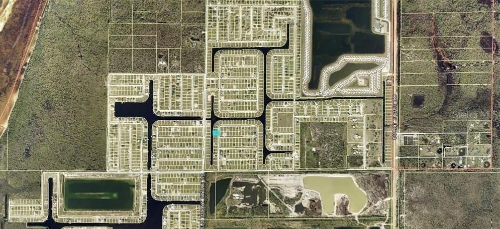 Discover a rare opportunity to build in one of the most desirable waterfront locations—where every day ends with a show-stopping sunset. This premium Western-exposure lot offers wide-open water views, a sturdy seawall, and a concrete dock already in place, giving you instant access to effortless boating, fishing, and evening cruises. Just moments from the brand-new Crystal Lake Park, you’ll enjoy quick access to beaches, restaurants, shopping, hotels, schools, boat ramps, and endless recreation. It’s the perfect blend of tranquility and convenience—an ideal setting for your dream home or a smart investment in a rapidly growing area. This is more than a lot; it’s a lifestyle. Claim your slice of paradise and start imagining the waterfront life you’ve always wanted.