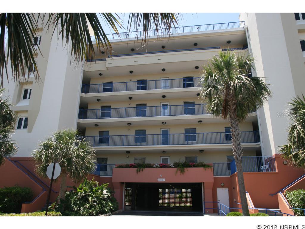 Lowest Priced Jr Penthouse in Ocean Walk! You will not be disappointed when you step into this 3 bedroom 3 bath condo. Granite kitchen with breakfast bar, tile floors and brand new carpet in the bedrooms. Master suite with a sliding glass door out to balcony, walk in closet, 2 separate vanities and sinks, tile floors, Jacuzzi tub and a separate walk in shower. The 2nd Master suite also has a sliding glass door out to the balcony, double vanity with 2 sinks and a walk in shower. His and her closets, linen closet in bathroom. The 3rd bedroom has a peek of the ocean, nice size closet and bath room outside of the doorway with a full size linen closet in the hallway.Inside laundry room has ample room for storage and the unit comes with a private storage unit on the same floor. The other amenities are steps away and include two  Clubhouses, meeting room, two heated swimming pools, spa, sauna, a gym, two lighted tennis courts, basketball, shuffleboard,  mini putting green, Kayak launch, nature preserve with walking trails and of course, the Atlantic Ocean and No-Drive beach are right across the road and a beach walk over.This gated community offers secured garage-covered parking. ;LocationDescription: Condo ;Water: City
