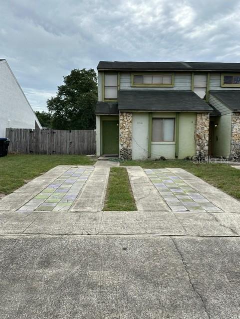 Located in Fox Hunt Lanes, just minutes to UCF, Research Park and major highways, this 2 Bedroom/2 Bath townhouse features a split plan with one bedroom and full bath upstairs and downstairs! Screened porch and laundry room with full size washer/dryer.