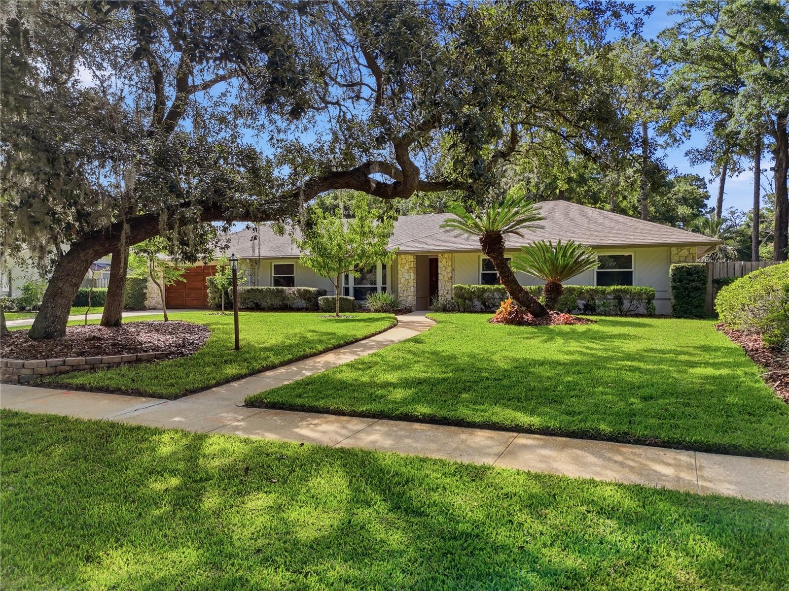 Discover a home that has been truly lived in, loved, and thoughtfully improved over time. Nestled beneath mature oak trees in the established Bent Oak community, this beautifully maintained pool home offers the perfect blend of character, comfort, and modern updates; all on an oversized, private lot with no rear neighbors.

As you make your way from the sidewalk, you open the front door and enter inside a warm and inviting floor plan which offers multiple living spaces designed for both everyday comfort and entertaining. From the warmth of luxury vinyl plank flooring to the carefully crafted kitchen and updated baths, every detail speaks to modern sophistication. 

The Remodeled kitchen serves as the heart of the home and has a seamless connection to the laundry room, breakfast nook and family room. The vaulted ceiling elevates the family room and showcases a wood-burning fireplace. The French doors open to the expansive lanai, creating effortless indoor-outdoor living and filling the home with natural light and peaceful views of the sparkling pool.

The spacious primary suite offers a private retreat with a beautifully remodeled en-suite bath and walk-in closet, while luxury vinyl plank flooring flows through the Living and Dining Room. Over the past 13 years, the homeowners have thoughtfully invested in nearly every major component of the home. Some upgrades include luxury vinyl plank flooring (2021), water heater (2022), main electrical disconnect (2023), exterior paint (2024), energy-efficient replacement windows (2024), and a newly rescreened pool enclosure (2025), providing comfort and peace of mind for years to come. 

Step outside to discover the true centerpiece of the property. The oversized lanai surrounds an oversized pool with solar heating, creating an ideal space for relaxing weekends, family gatherings, and entertaining guests year-round. Beyond the pool, the backyard offers its own private orchard with mature peach, apple, orange, banana, fig, blackberry, raspberry, and pineapple plants. A play set is also included, making this outdoor space as functional as it is inviting.

Additional features include hurricane panels for most exterior openings, a rebuilt pool pump and salt cell, newer backyard fencing, and an oversized lot with exceptional privacy.

Ideally located just minutes from Wekiwa Springs State Park, Kelly Park/Rock Springs Run, Northwest Recreation Complex, shopping, dining, and convenient access to SR-429, this home offers the perfect balance of tranquility and accessibility.

This isn't a home that was renovated for resale, it's one that has been lovingly cared for, continuously improved, and filled with memories for more than a decade. Now it's ready for its next family to begin writing their next chapter.