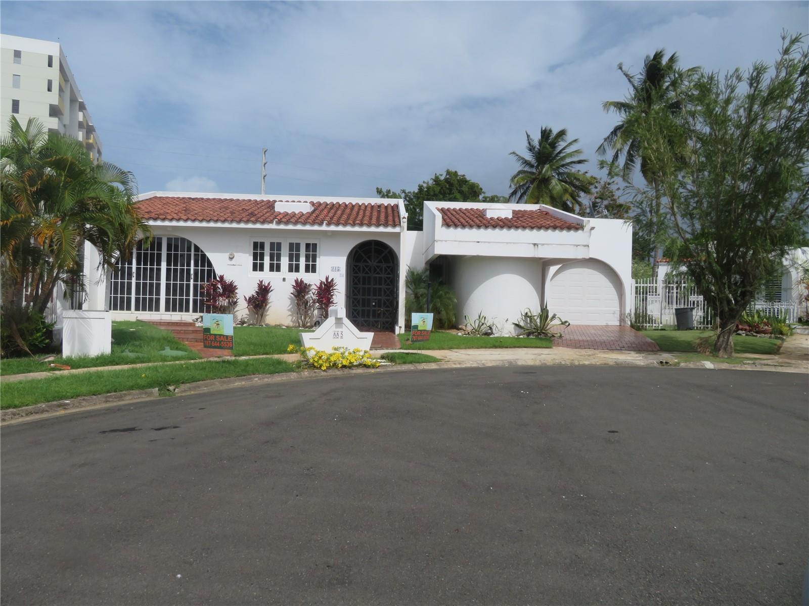 Price lower than the appraisal.Welcome to your new home opportunity in the heart of the beautiful gated community Dorado del Mar in Dorado, Puerto Rico in a CUL-D-SAC, that can be rented as an Airbnb. This property, a 5 bedroom, 3 bathroom house an office with a lots of natural light that can become in the fifth bedrooms, situated on a generous 796 meters lot, offering both space and potential for personalization. The house provides a blank canvas for those looking to infuse their style and modern touches. As you enter the property, you're greeted by a spacious living area that seamlessly flows into the dining space, providing an open and inviting atmosphere. Multiple windows and glass doors ensure the home is bathed in natural light, enhancing the sense of space. The spacious kitchen is a chef’s dream. Each of the five bedrooms offers comfortable living quarters with ample space for rest and relaxation. One of the most compelling aspects of this home is the expansive outdoor area with a Big Sun Room that at the same time, Sliding Doors and windows were built against hurricane winds of 150 miles- hour and ensuring a non-flood area. Has a nice gazebo and affords ample space for landscaping, a beautiful garden or even a private pool, making it an ideal spot for outdoor entertainment or serene relaxation. Living in this community isn't just about the home itself; it's about the lifestyle that comes with it. The gated community ensures privacy and 24 hour security, providing peace of mind for you and your family. The array of amenities within the community is unparalleled. Golf enthusiasts will revel in the meticulously maintained golf course, offering both challenge and beauty. Beach lovers will appreciate the easy access to the beautiful beach, perfect for sunbathing, swimming, or just enjoying the picturesque sunsets. For those who enjoy an active lifestyle, the community boasts tennis and basketball courts, catering to a range of sporting preferences. Additionally, the inclusion of parks and playgrounds makes this a family-friendly environment, ensuring there’s something for everyone. Another significant advantage of this location is the proximity to the Dorado Academy, a highly acclaimed p. school known for its excellence in education. Having such a reputable educational institution within the subdivision is a convenience that cannot be overstated for families. In addition to the community's internal features, this property is ideally located close to essential amenities. Convenient stores, supermarkets, a variety of restaurants, and retail options are just a short drive away, making daily errands and dining out both easy and enjoyable. Moreover, this property presents significant potential for short-term rentals and Airbnb, making it an excellent investment for both personal use and income generation. In summary, this property offers a unique blend of potential, space, and community amenities. Whether you’re looking to create your dream home or seeking a property with growth potential in a vibrant community, this house in Dorado, Puerto Rico, presents an opportunity not to be missed You have restaurants like New York, New York, Español Rest. and other countries Rest., without ruling out our country food. But not only that you have a Casino and a Bowling Alley around. You are nearTasis School and five minutes from Sabanera Health Center. In other words, you and your guests will never suffer from any need in this fantastic property.