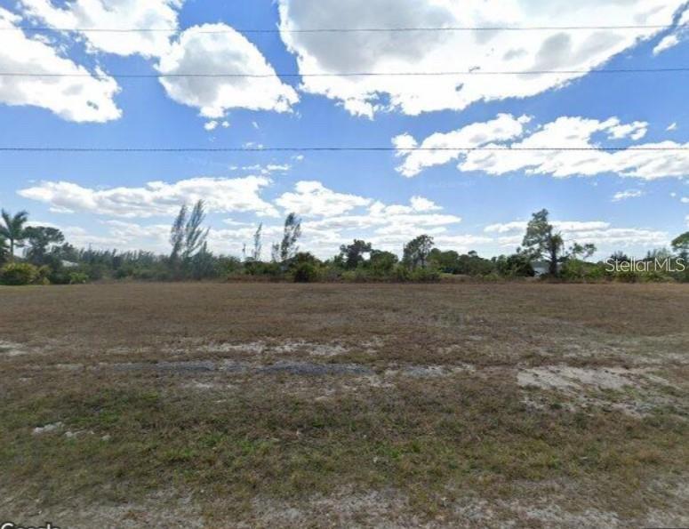 Rare waterfront opportunity in Cape Coral! Build your ultimate dream home on this prime, cleared 10,019-square-foot residential lot. Situated on a serene canal, this property offers direct backyard access to Florida’s famous waterfront lifestyle. The location is highly desirable, placing you just minutes from local shopping centers, dining, and top-rated schools. Enjoy quick access to major roadways for an easy commute, while still living in a peaceful neighborhood setting. Bring your builder and design the perfect custom estate to start living the Sunshine State dream today!