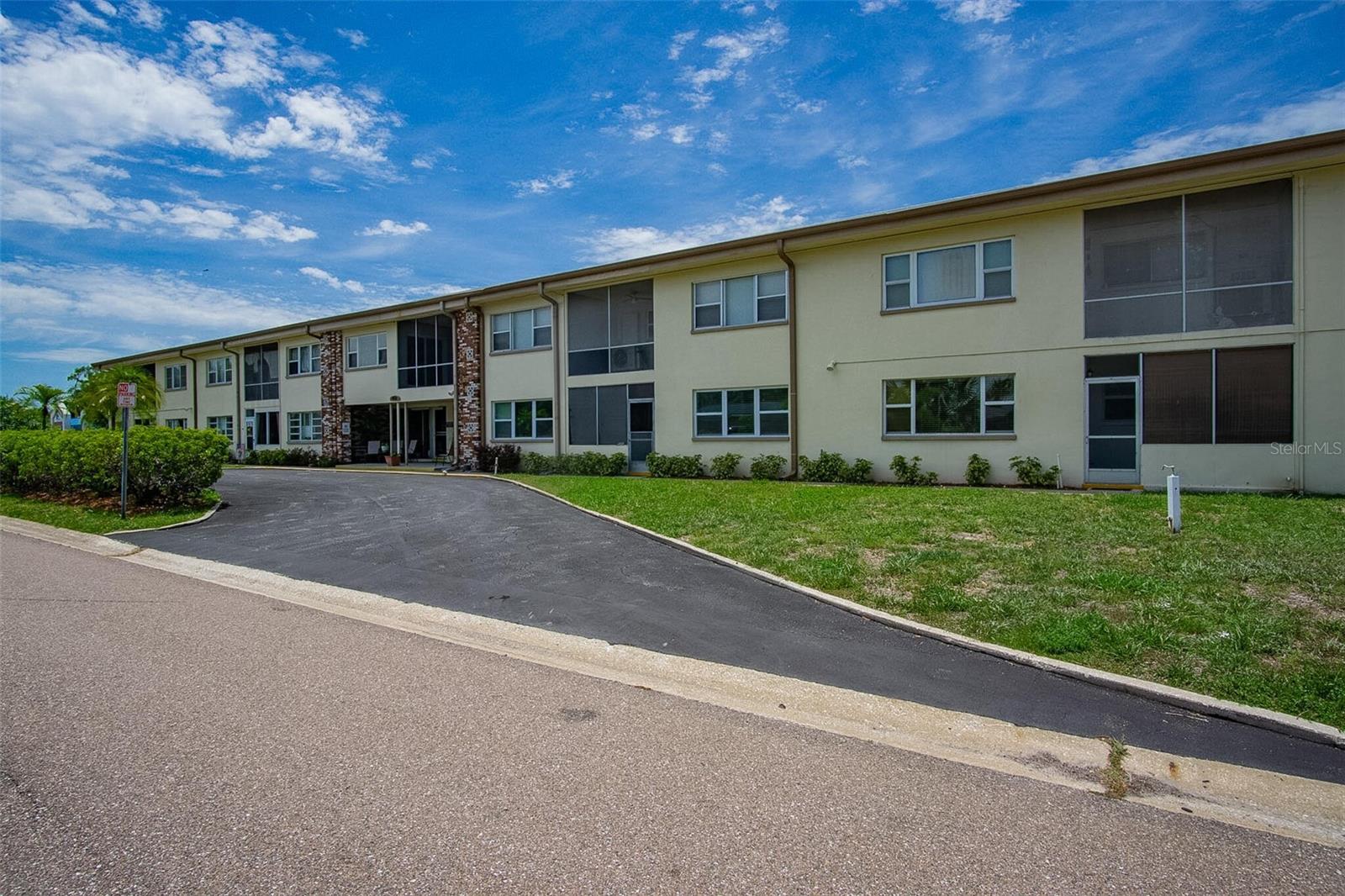 NO FIXER UPPER HERE! As the old saying goes you get what you pay for with this one! Unit was fully remodeled with over 50K of pro selected interior designer upgrades in 2024-5!  Windows, doors, electric panel & HVAC!  MOTIVATED SELLER! NO HOA UNTIL 2027! Unlike many condos this building has NO aluminum wiring, it has all much safer copper! This unit open to any age group. The new kitchen includes all stainless-steel appliances a side by side frig, disposal & dishwasher. Step out onto your screened in tiled lanai. The local St Pete area is home to 100's of businesses both small mom & pop & big box stores and restaurants. Hoa fee includes internet tv, & hot water; there is no land lease, and being only 2 stories no costly milestone inspections!. Laundry room & assigned covered parking spot included. No pets/rentals. 10 minutes to downtown St Pete!