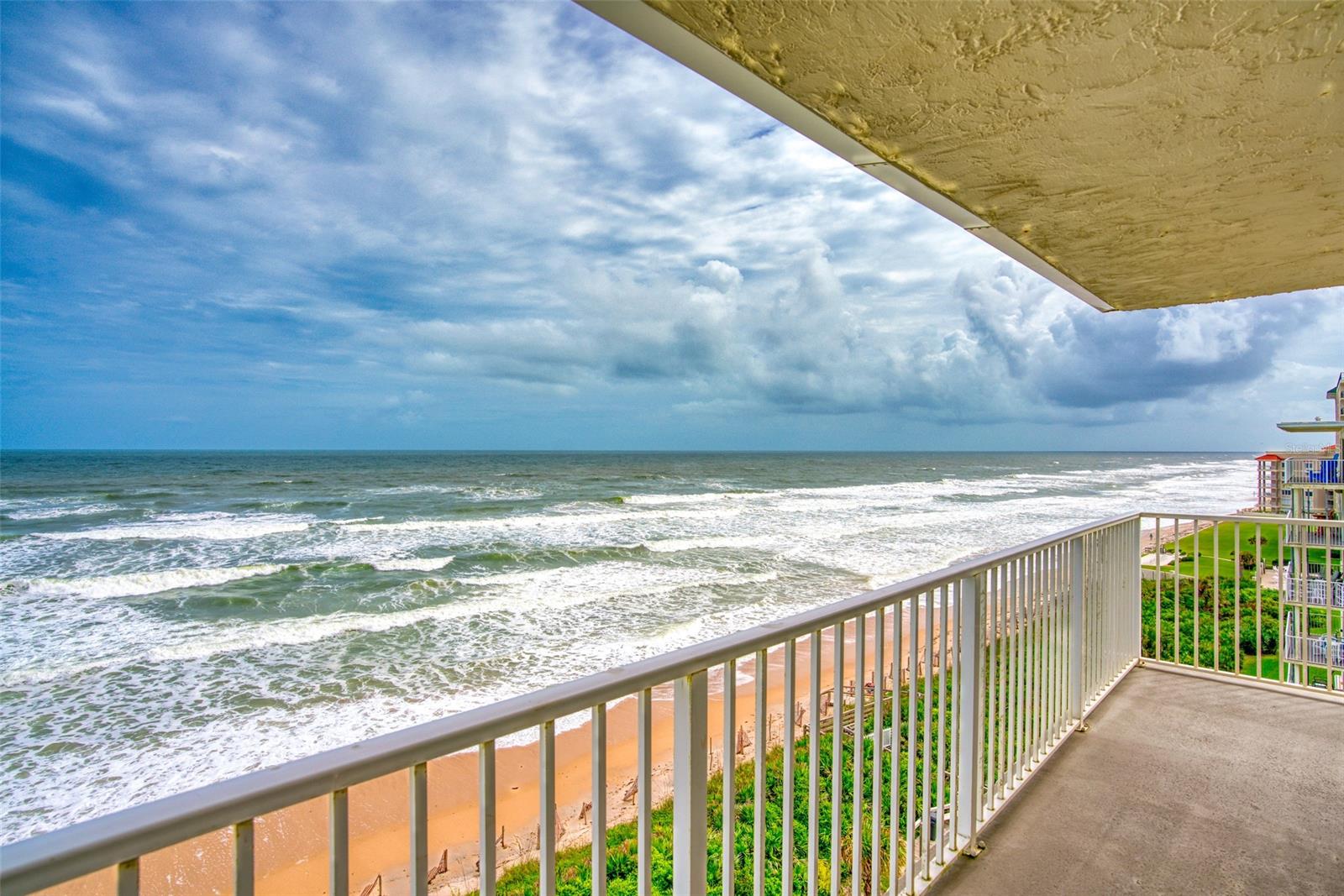 TOP floor CORNER 2 bed 2 full bath unit - now is your chance to make an investment your future self will thank you for. As you enter onto the 7th floor, you will find views of the intracoastal waterway and mosquito lagoon. Here you can catch some of the best sunsets you could ever witness. Unit 73 boasts an upgraded kitchen with granite countertops and an ocean view that greets you with open arms. The floor plan is open and has plenty of natural light from the side windows that only a corner unit can offer. The master bedroom features ocean views and a jetted tub, whilst the guest provides intracoastal views. The large L shaped balcony is an entertainer's dream, with plenty of room to spread out and appreciate the peace and serenity of the no-drive section of New Smyrna Beach. 2016 AC unit, 2017 hot water heater and a FULL size washer and dryer located inside the unit. ;Water: City