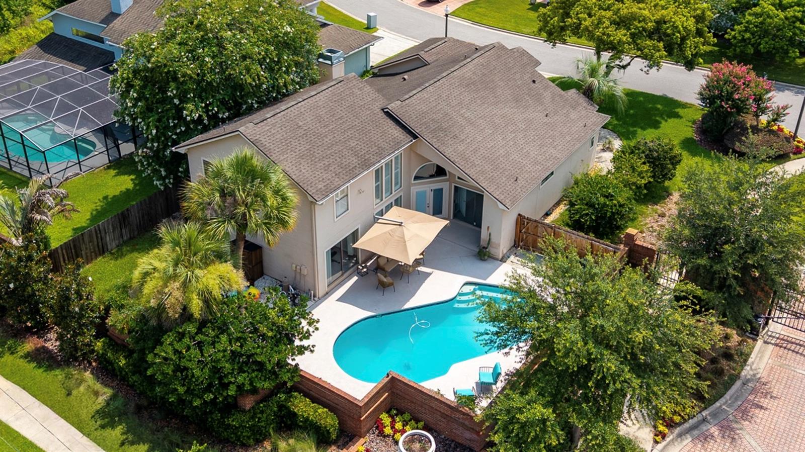 Live where Old Florida still exists — with the peaceful feel of a nature preserve, right in your backyard.
Tucked behind the gates of Sweetwater Springs — a beautiful, gated enclave bordering Wekiwa Springs State Park — this 4-bedroom, 3.5-bath pool home offers 2,526 square feet on a private corner lot. Soaring ceilings and a smart split floor plan create a sense of space and light throughout, delivering privacy where you want it and openness where you need it. Upstairs, a private loft with its own separate bedroom and full bath offers the perfect retreat for overnight guests or an in-law suite. Homes here don't come up often. When they do, they move fast.
The owner has spared no expense keeping this home in exceptional condition. Recent capital improvements include an architectural shingle roof (2018), a 2-zone AC system with the main-level unit replaced in 2021, a resurfaced pool with new tile (2020), all three full bathrooms remodeled (2018), a brand-new walk-in shower in the pool bath (2026), an acrylic-resurfaced garage floor (2021), a newer water heater (2022), a new backyard fence (2023), and refreshed front landscaping (2018). The living room, dining room, foyer, and kitchen were freshly painted in 2026, along with a new Andersen front door (2024) and a freshly painted garage — this is a home that has been meticulously maintained from the roof down to the finishes. True low-maintenance living: move in, and spend your weekends on the water instead of on a to-do list.
Then there's the lifestyle money can't manufacture anywhere else. Private access to the Wekiva River. Direct access to 285-acre Lake Brantley, one of Florida's premier spring-fed ski lakes. A private kayak launch that puts you paddling straight into Wekiwa Springs State Park within minutes — cypress canopies, protected wildlife, manatees, otters, deer, and wild turkeys as your neighbors. Add in private parks, tennis and pickleball courts, and playgrounds exclusive to the 79 homes of Sweetwater Springs, and you have a community that doesn't just offer a lifestyle — it defines one.
Zoned for top-rated schools. Sweetwater Springs inventory is scarce, demand is strong, and this one won't last. Call for your private tour today!