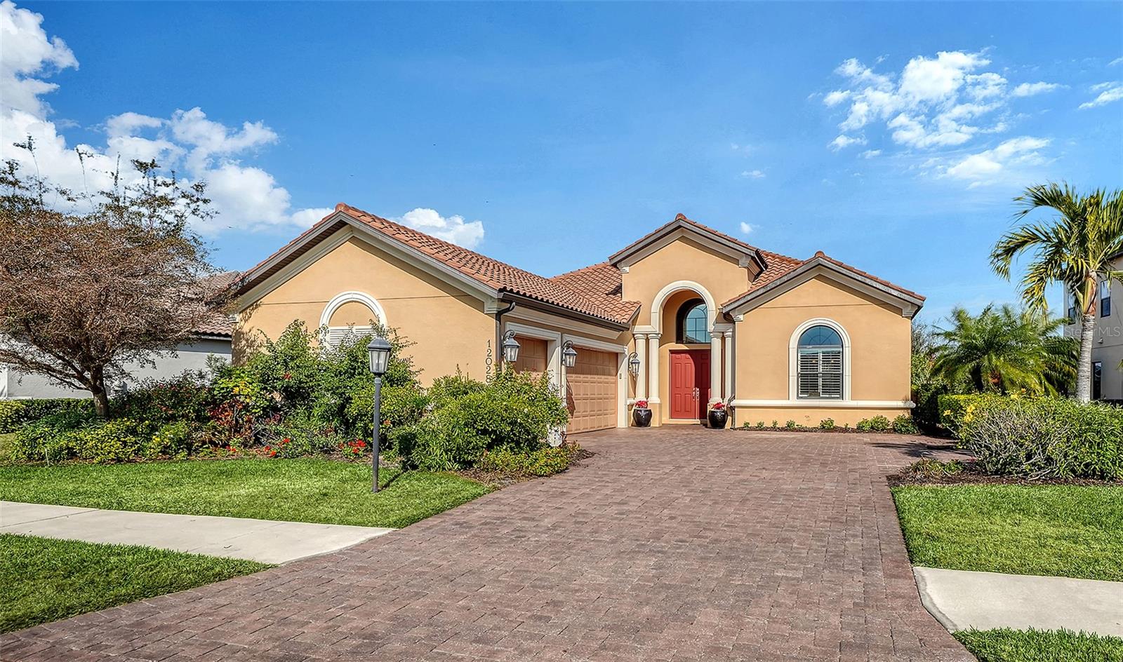 Experience Florida luxury in this exquisite fully furnished 2862 square feet, 3-bedroom, 3.5-bath with 3 car garage residence, nestled in the gated maintenance free enclave of Legacy Estates at Palmer Ranch. This meticulously designed home combines unparalleled comfort, offering complete peace of mind with a robust emergency generator, whole-house impact glass windows and roll down hurricane screens.
Entertainers will delight in an open floor plan that leads to the opulent outdoor kitchen, featuring a professional 60,000 BTU gas burner—the perfect setting for creating culinary masterpieces under the Florida sun. The inviting en-suite primary bedroom features two walk-in closets.   Designed for a care-free lifestyle, the open floor plan flows seamlessly, highlighting elegant finishes throughout. This home features a gourmet kitchen with an expansive quartz island, tray ceilings and extended covered outdoor lanai.
Residents enjoy exclusive access to resort-style amenities, including dog parks, 8 Pickleball courts, 2 tennis courts, splash park, a stunning pool, spa, fitness center, and a dedicated lifestyle manager. This home offers the perfect blend of security, convenience, and luxury living in one of Sarasota's most sought-after communities, close to beaches and top-tier dining. Convenient Sarasota location with easy access to Pine View Gifted School, Costco, Legacy bike and walking trail. Nearby Whole Foods and Trader Joes opening soon. Make your life easy and elevate your lifestyle today.