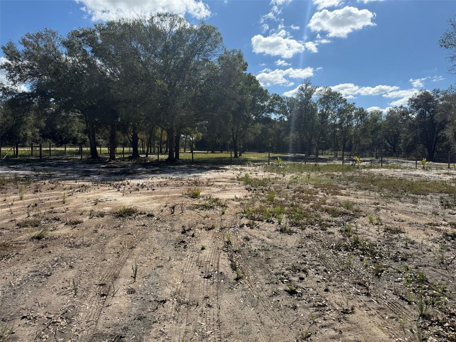 Discover this beautiful 1.25-acre cleared corner lot in the peaceful Viking/Prairie area of Okeechobee! This fully fenced property comes ready for your vision with a survey completed, culvert already installed, and power available right at the road. The land features its own private pond, adding charm and natural beauty, along with a gazebo perfect for relaxing and enjoying the quiet surroundings. A well is already on the property, giving you a valuable head start for future use. With a gated entrance, excellent access, and plenty of space, this parcel is ideal for a weekend getaway, recreational use, or a future homesite. Don’t miss this well-prepared and attractive 1.25-acre property in a growing rural community!